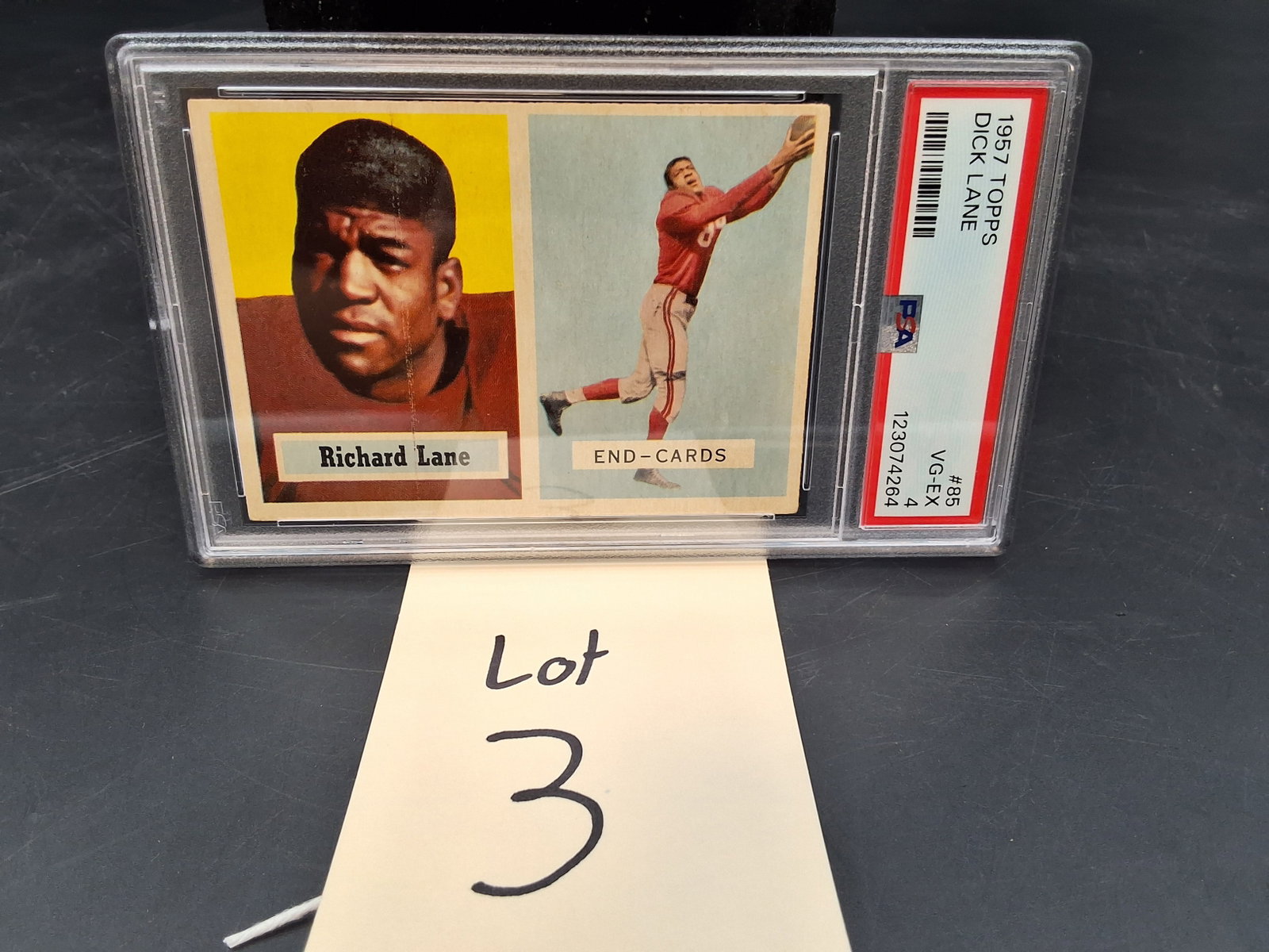 1957 Topps Dick Lane PSA 4: 1957 Topps Dick Lane PSA 4 Condition All property is sold in "as is" condition and all sales are final. Teel Auctions and its consignor make no representations or warranties, express or implied, with 