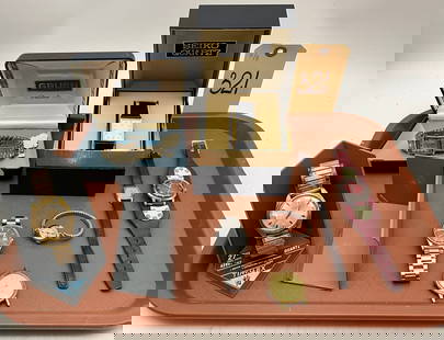 Gruen, Seiko, Bulova, and Waltham Watches: Wristwatches, featuring Gruen, Seiko, Bulova, and Waltham models, with notable designs and styles. Includes a vintage Gruen