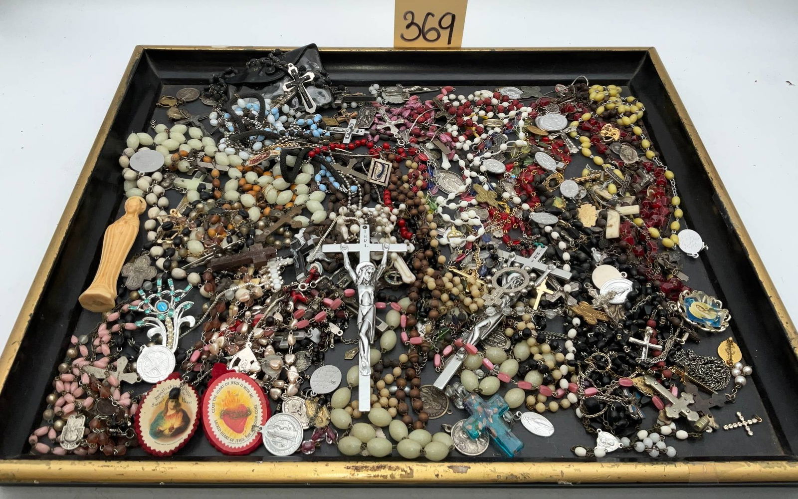 Rosary Beads with Crucifixes, Medallions, and Religious Charms (1 of 5)