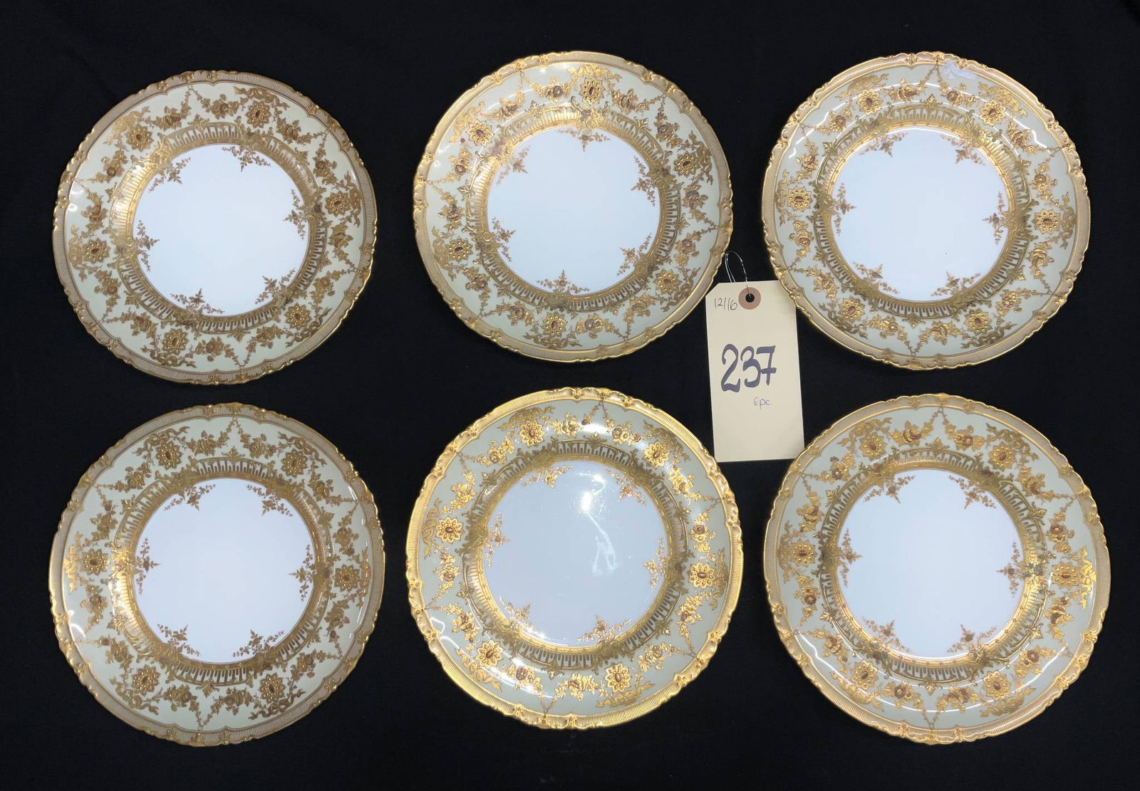 Six 8.5-inch Tiffany Royal Crown Derby ‘Kings Plate’ Porcelain Dinner Plates: Six 8.5-inch Tiffany Royal Crown Derby 'Kings Plate' porcelain dinner plates featuring intricate gold decoration with ornate scrollwork and floral motifs on a white ground. Each plate bears the printe