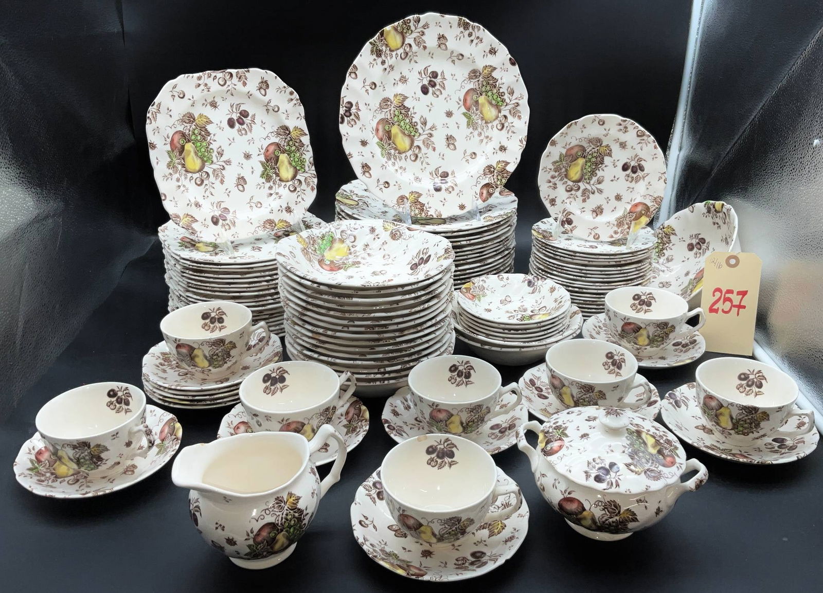 Johnson Bros “Autumn’s Delight?? English China Dinnerware Set, Approx. 80 Pieces: Approximately 80 pieces of Johnson Bros china in the “Autumn’s Delight” pattern, made in England. Featuring a colorful fruit and floral motif with scalloped edges. Includes dinner plates, sa