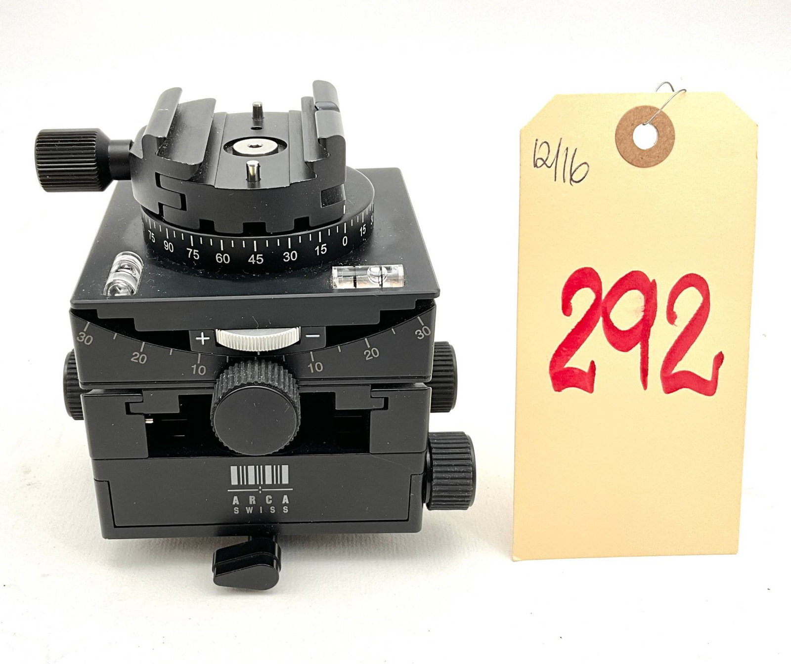 Arca-Swiss Tripod Head with Precision Adjustment Controls: Arca-Swiss tripod head featuring precision adjustment mechanisms characterized by multiple control knobs for fine-tuning. Includes a quick-release clamp compatible with the Arca-Swiss mounting system.