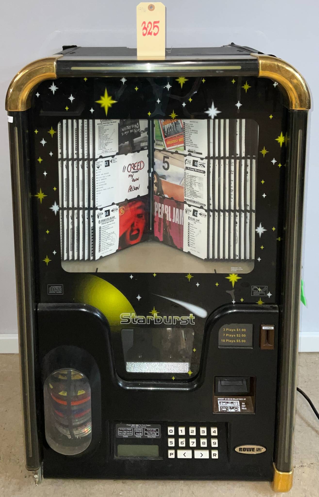 Starburst WP-100S Coin-Operated Wall-Hanging Jukebox with Key (1 of 7)