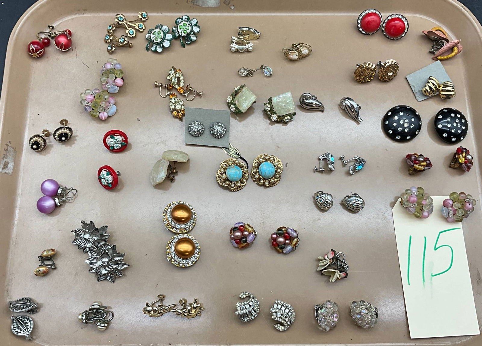 Vintage Clip-On Earrings from Florenz, Coro, West Germany, Japan, and Others: Vintage clip-on earrings featuring designs by Florenz, Coro, West Germany, and Japan, alongside other unnamed makers. Comprising various styles, including floral motifs, rhinestone accents, faux pearl
