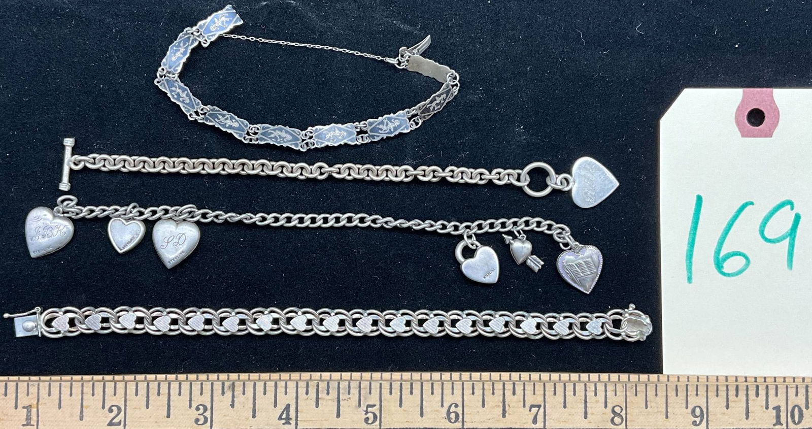 Sterling Silver Bracelets with Heart Charms and Chain Links (1 of 4)