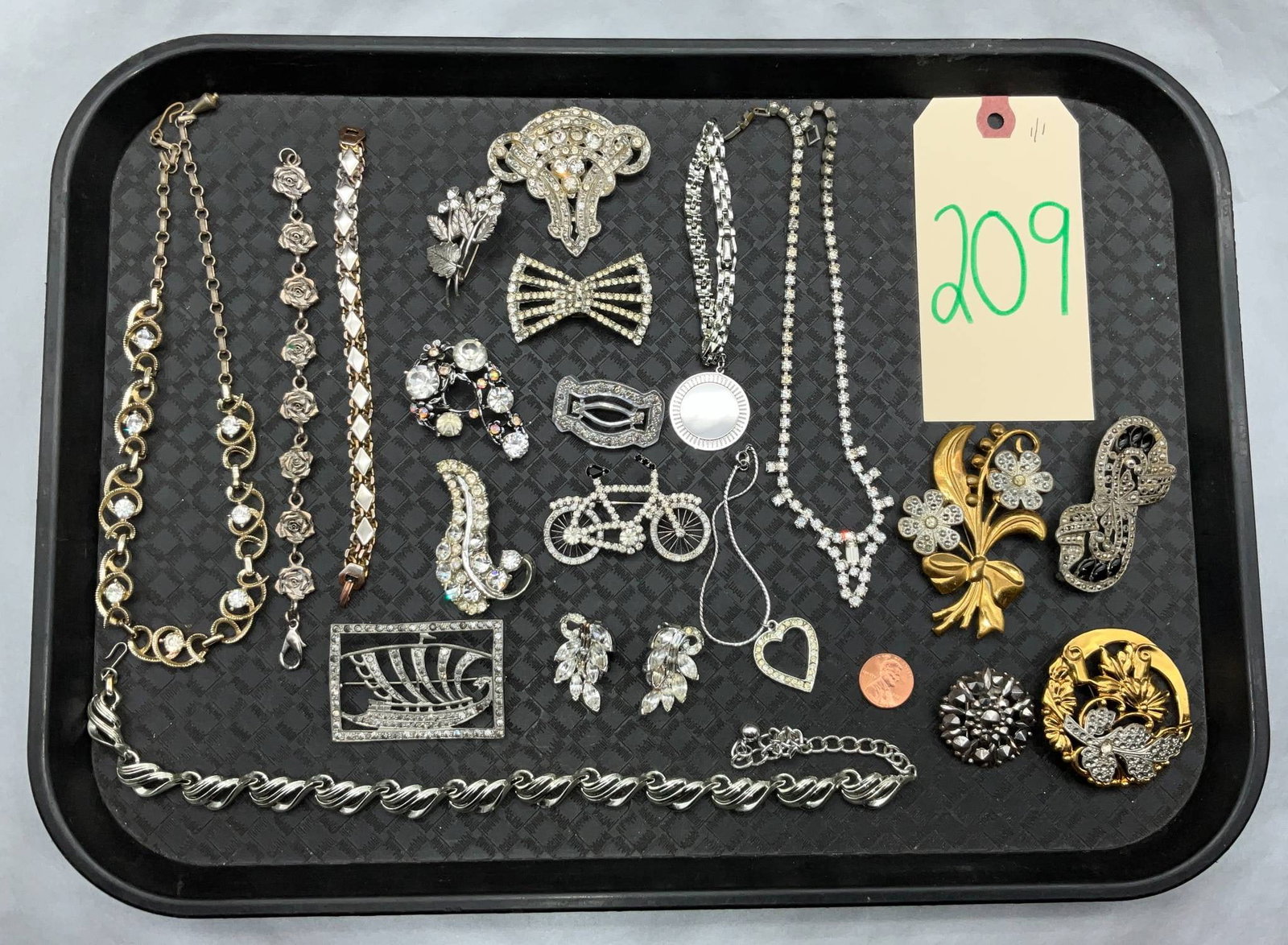 Rhinestone-Encrusted Jewelry Lot with Pieces from Bauer, Bell, and J.N.C.: Rhinestone-encrusted jewelry lot featuring a variety of brooches, marcasite pins, earrings, dress clips, necklaces, and more. Makers include Bauer, Bell, J.N.C., and others. Constructed with rhineston