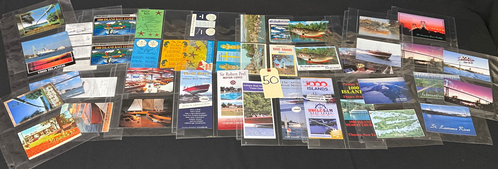A Collection of Vintage Postcards and Paper Ephemera from the 1000 Islands Region: This is a collection of pieces of vintage postcards and paper ephemera related to tourism in the 1000 Islands region of New York and the St. Lawrence River. The lot includes souvenir postcards, folded
