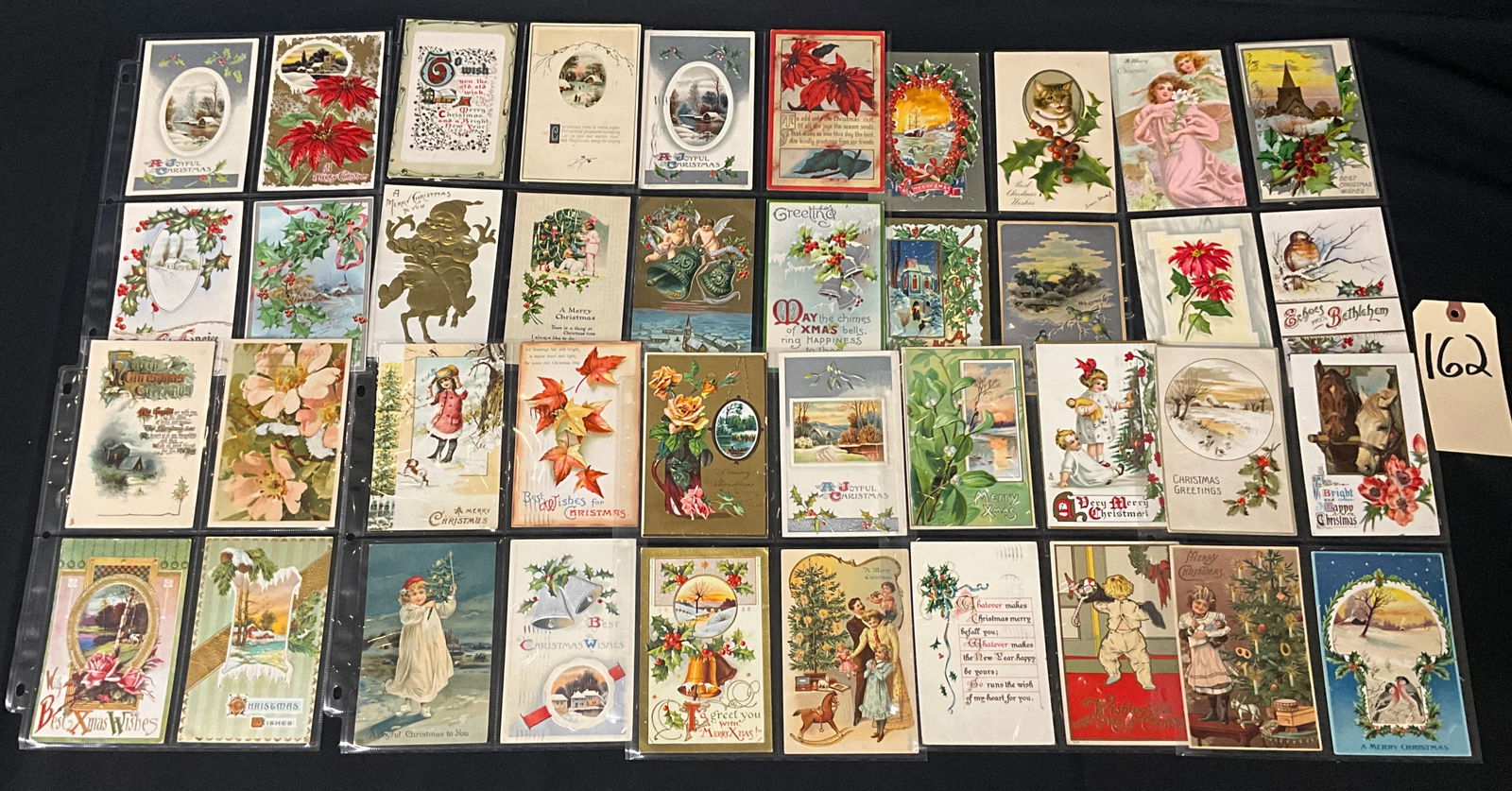 Christmas and New Year's Postcards, 1907-1913: This collection contains approximately 32 printed chromolithographic postcards from the Golden Age of Postcards, featuring heavy embossing and seasonal greetings. The lot includes high-quality example