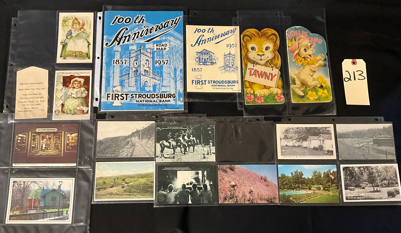 Stroudsburg Pennsylvania Ephemera and Postcard Collection, 1910-1957: This collection features vintage paper ephemera from Stroudsburg, Pennsylvania, including a 1957 road map and booklet commemorating the 100th anniversary of The First Stroudsburg National Bank.