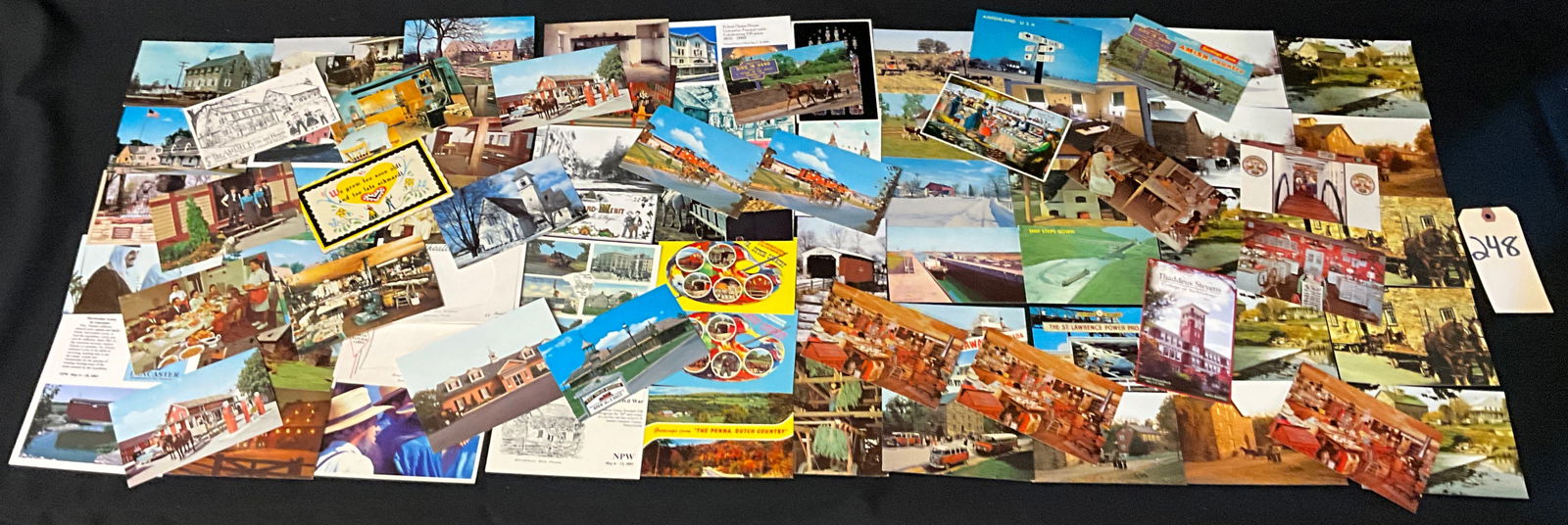 Lancaster County, PA Amish and Regional History Postcard Collection, 1960s-2003: This collection features approximately 60 pieces of printed ephemera, primarily consisting of glossy chrome era postcards documenting Pennsylvania Dutch Country. Key subjects include Amish farm life i