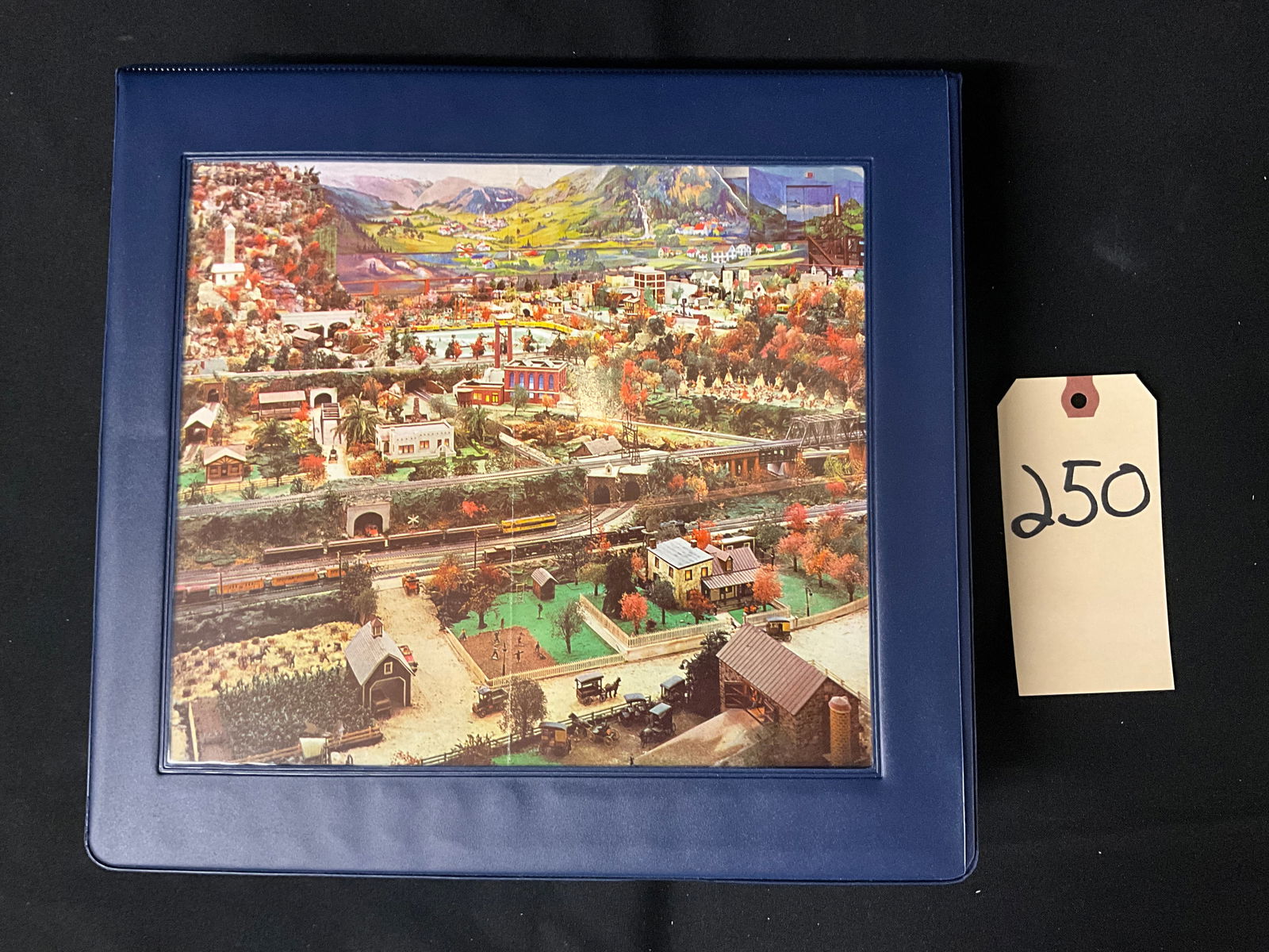 Roadside America Miniature Village, Photographic Slide Collection, c. 1950s-1990s: This collection features original souvenir sets of 35mm color slides from Roadside America in Shartlesville, Pennsylvania, housed in a modern blue vinyl binder. The souvenir sets, titled Scenic Wonder