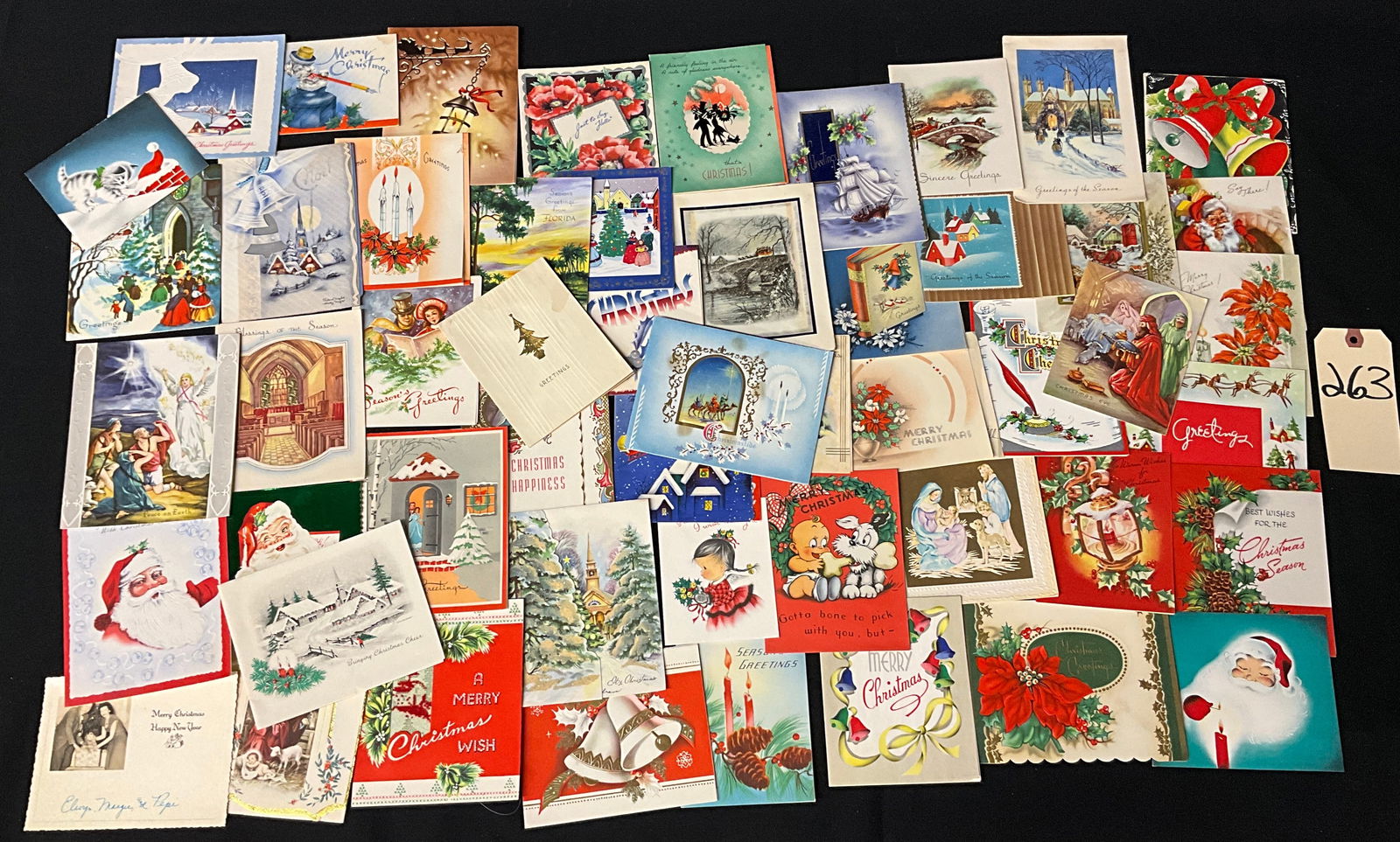 Vintage Mid-Century Christmas Greeting Cards Lot, Circa 1940s-1960s: This collection features approximately 50 vintage printed Christmas greeting cards dating from the 1940s to the 1960s produced by various American manufacturers. The assortment includes holiday imager