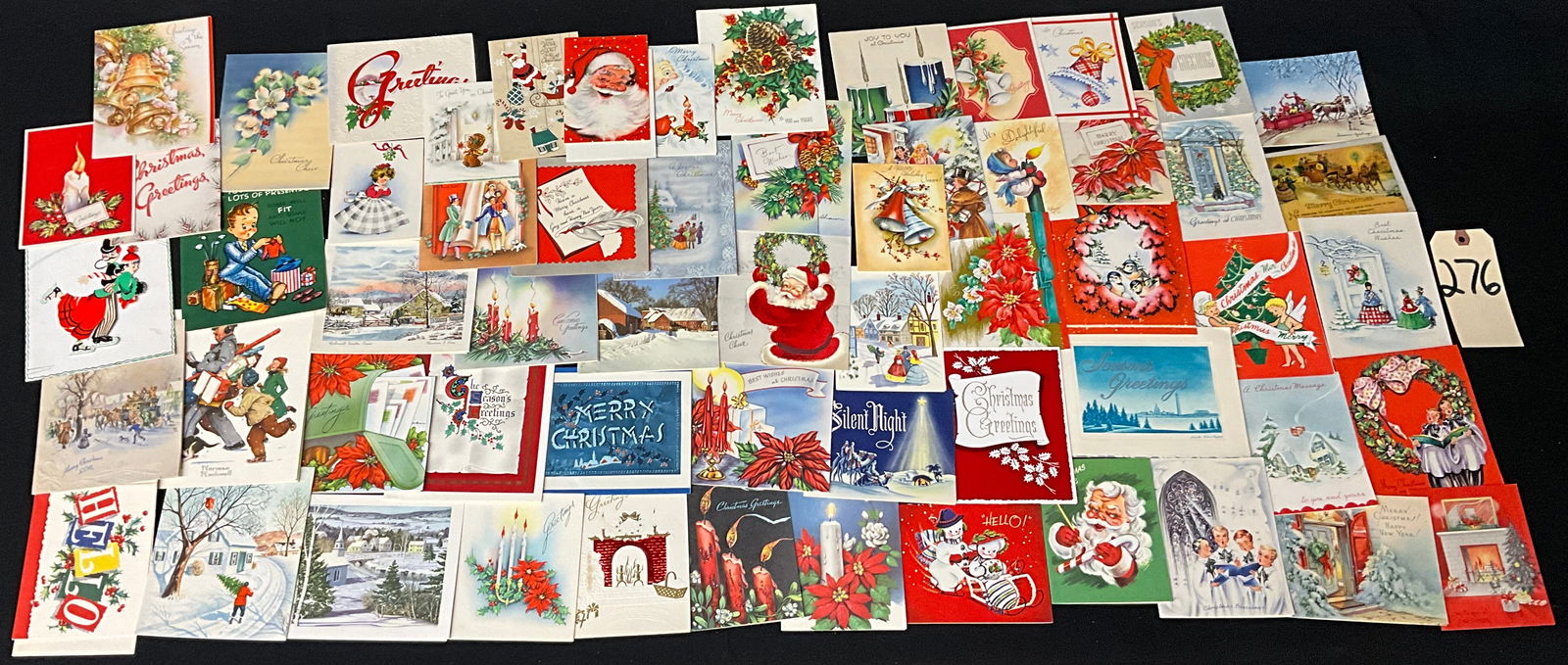Mid-Century Holiday Imagery, Greeting Cards, 1940s-1960s: This lot consists of approximately 65 printed mid-century Christmas greeting cards featuring traditional and kitsch illustrations of Santa Claus, snowmen, and winter landscapes. Major publishers repre