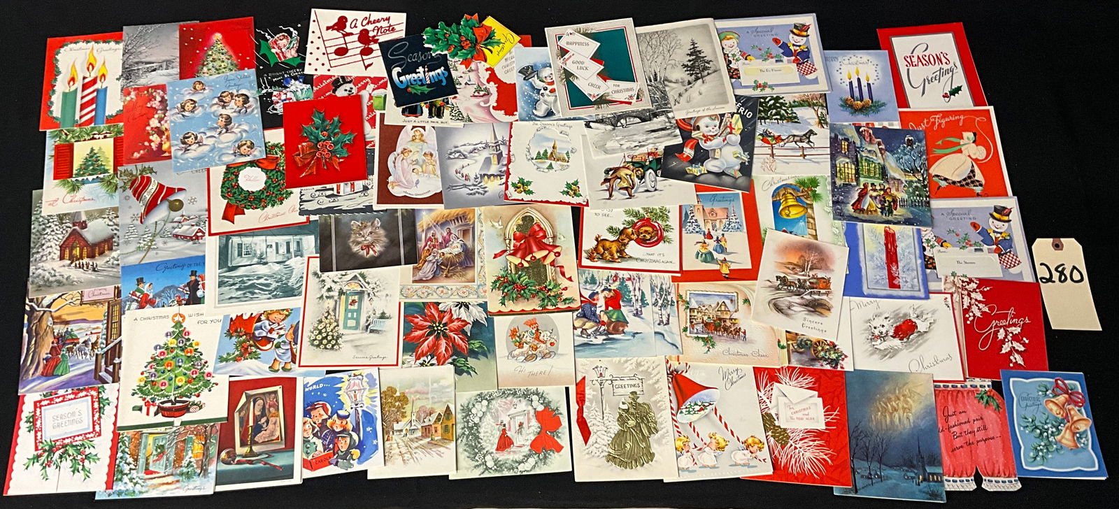 Vintage Mid-Century Christmas and New Year's Greeting Cards and Postcards: This collection consists of vintage holiday greeting cards and printed postcards dating approximately from the 1940s to the 1960s. The assortment includes standard folded cards, die-cut designs, and e