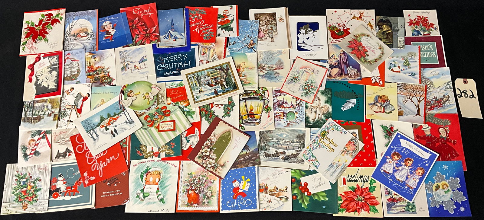Mid-Century Christmas Greeting Cards, Paper Ephemera Lot, 1940s-1960s: This collection contains approximately 60 printed vintage Christmas greeting cards featuring bi-fold, tri-fold, and die-cut designs from the 1940s to the 1960s. The assortment includes winter landscap