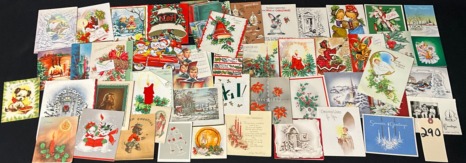 Vintage Mid-Century Christmas and New Year Greeting Card Collection, Circa 1940s-1960s: This collection consists of approximately 45 vintage holiday greeting cards, featuring bi-fold, die-cut, and a large novelty mechanical pants card. The items date from the 1940s to the 1960s and inclu