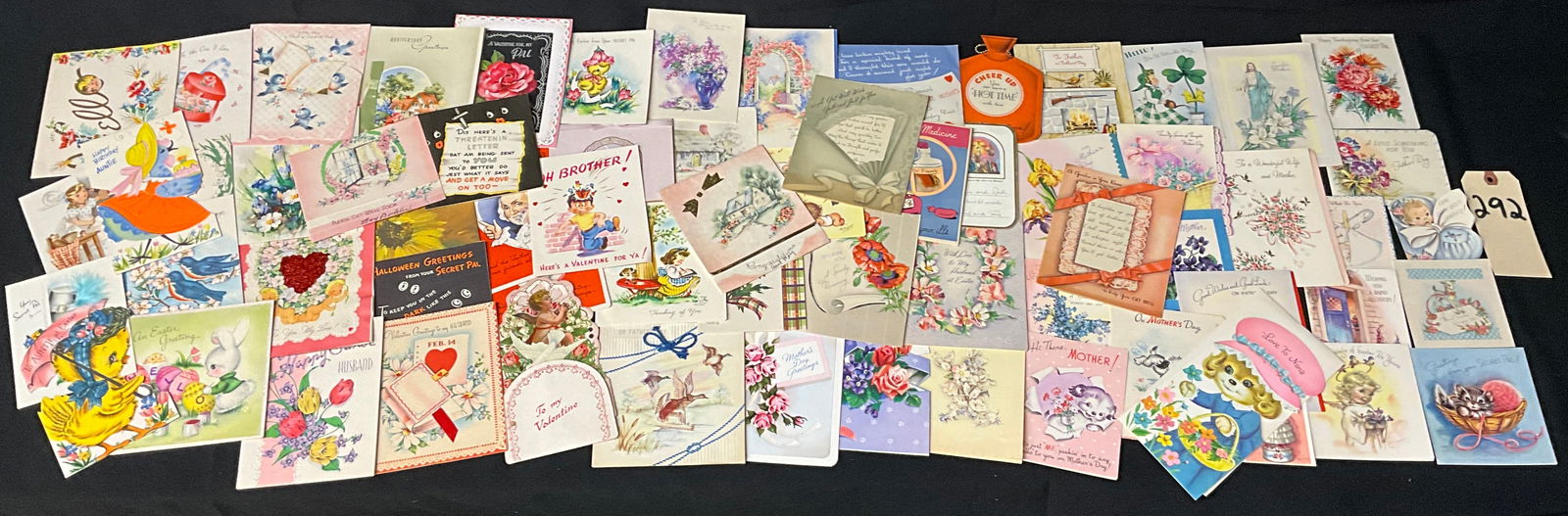 Mid-Century Greeting Card and Holiday Ephemera Collection, Circa 1940s-1960s: This extensive collection includes over 50 vintage greeting cards and paper ephemera items spanning the mid-20th century. The assortment covers major holidays such as Valentine's Day, Easter,