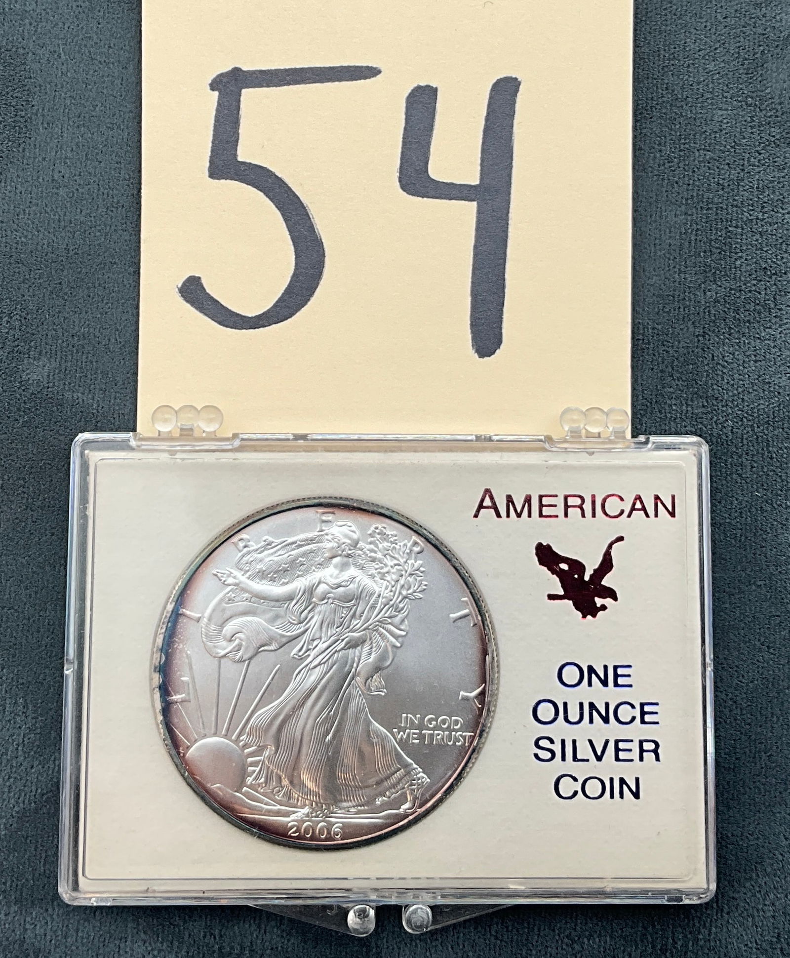 US 2006 American Silver Eagle, Silver, KM-273: American Silver Eagle one dollar bullion coin, KM-273. Obverse designed by Adolph A. Weinman and reverse by John Mercanti. Walking Liberty obverse and Heraldic Eagle reverse. This silver coin contains