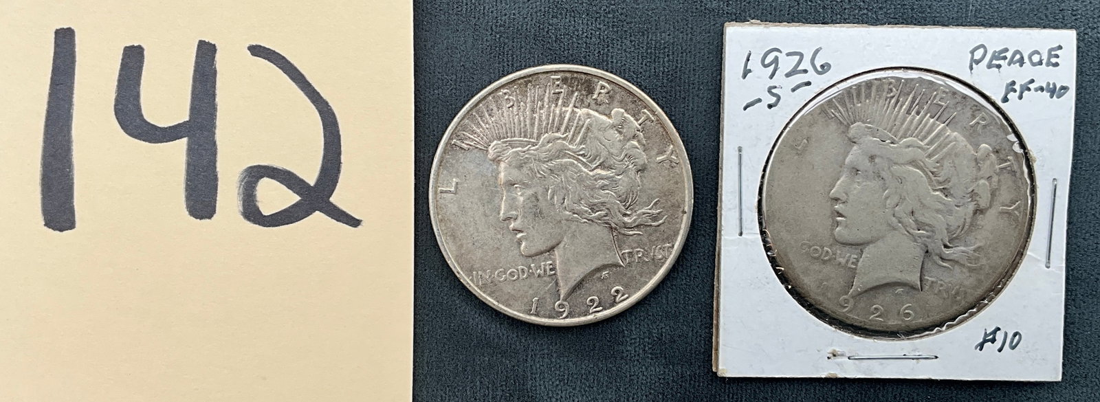 A Pair of US 1922 & 1926-S Peace Dollars, Silver, KM-150: KM-150. Designer: Anthony de Francisci. This pair consists of the Peace silver dollar type with 90% silver content. Mint markings include Philadelphia (1922) and San Francisco (1926-S). The 1926-S is