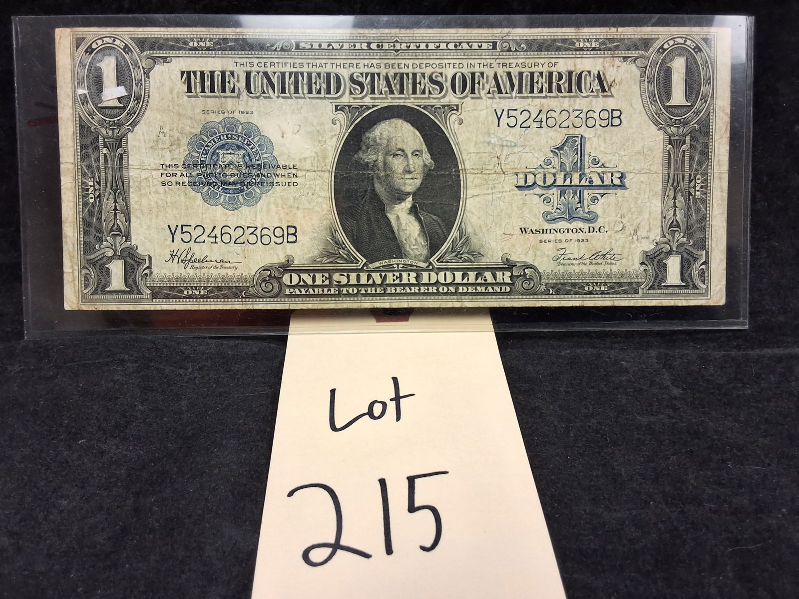US 1923 $1 Silver Certificate, Friedberg 237: Friedberg 237. Signatures of H.V. Speelman and Frank White. Washington obverse / Ornate reverse. Serial number Y52462369B. This series represents the final large-size one-dollar silver certificate