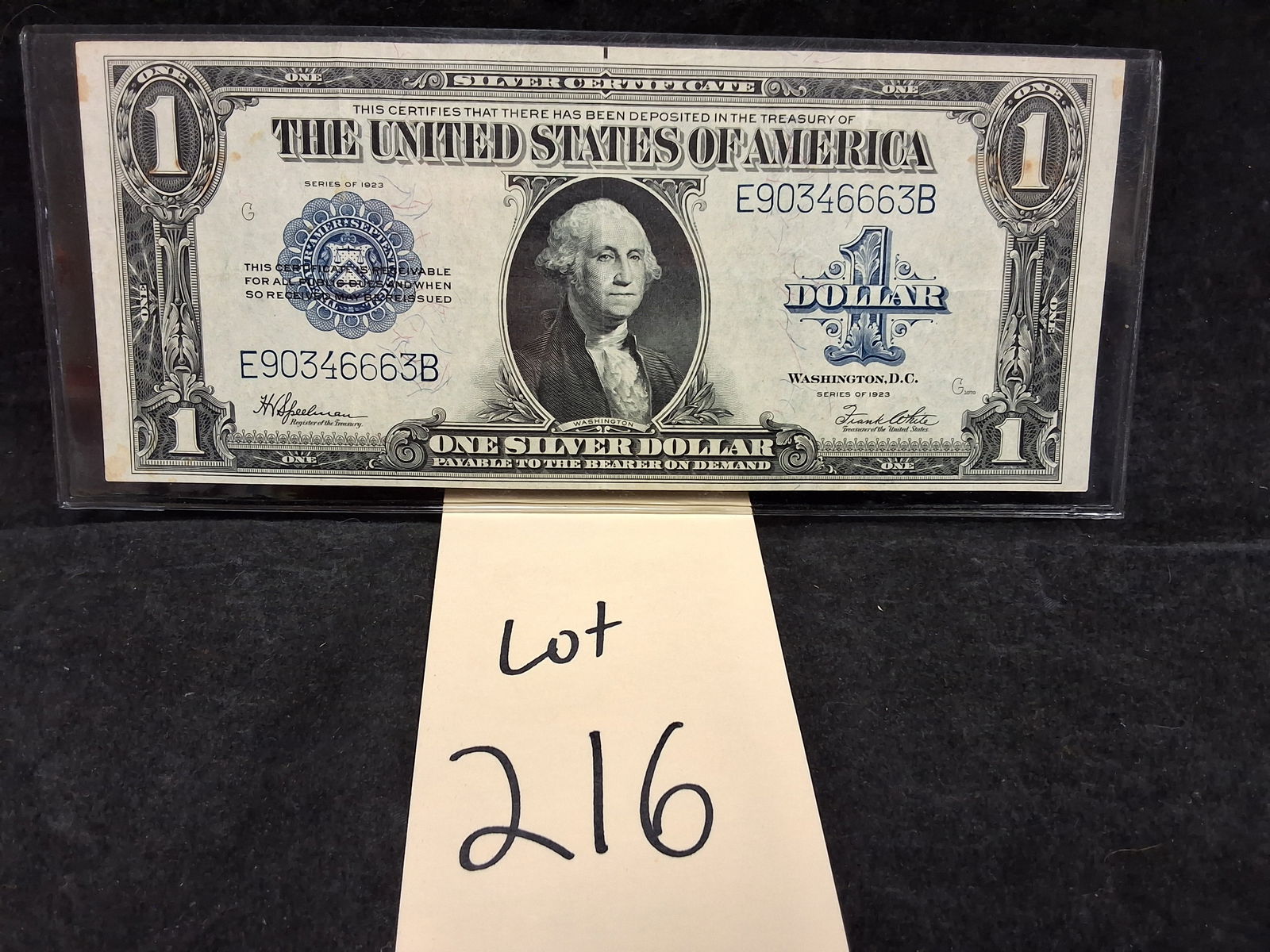 US 1923 $1 Silver Certificate, Fr-238, Speelman-White: Friedberg #238. Signatures of H.V. Speelman and Frank White. Washington portrait obverse / Ornate scrollwork reverse. Serial number E90346663B. This series represents the final large-size one-dollar s