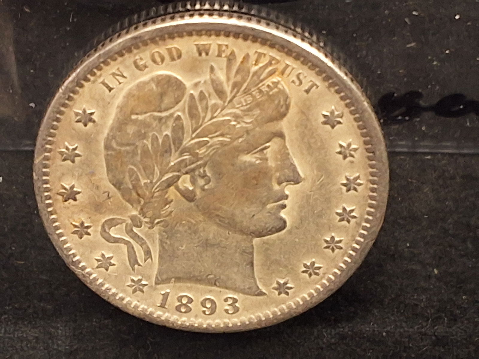 US 1893 Barber Quarter, Silver, KM-114: KM-114. Designer: Charles E. Barber. Philadelphia Mint. Barber obverse / Heraldic Eagle reverse. The 1893 Philadelphia mintage of over 5.4 million pieces represents a high-production year for the