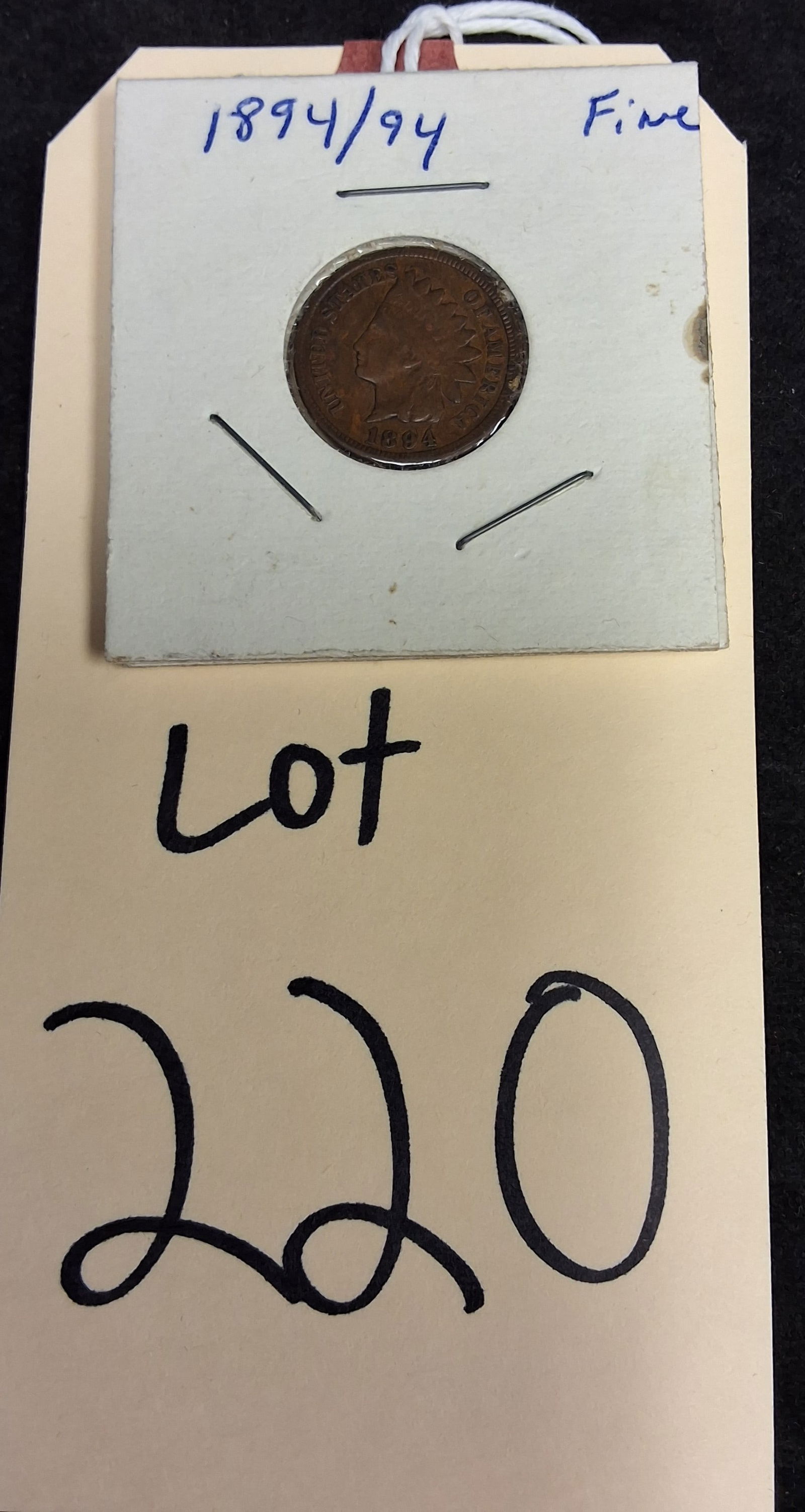 US 1894 Indian Head Cent, Repunched Date Variety, Bronze, KM-90a: KM-90a. Designer: James B. Longacre. Philadelphia Mint. Indian Head / Oak Wreath and Shield. This specimen features the repunched date variety, with doubling visible on the upper serifs of the