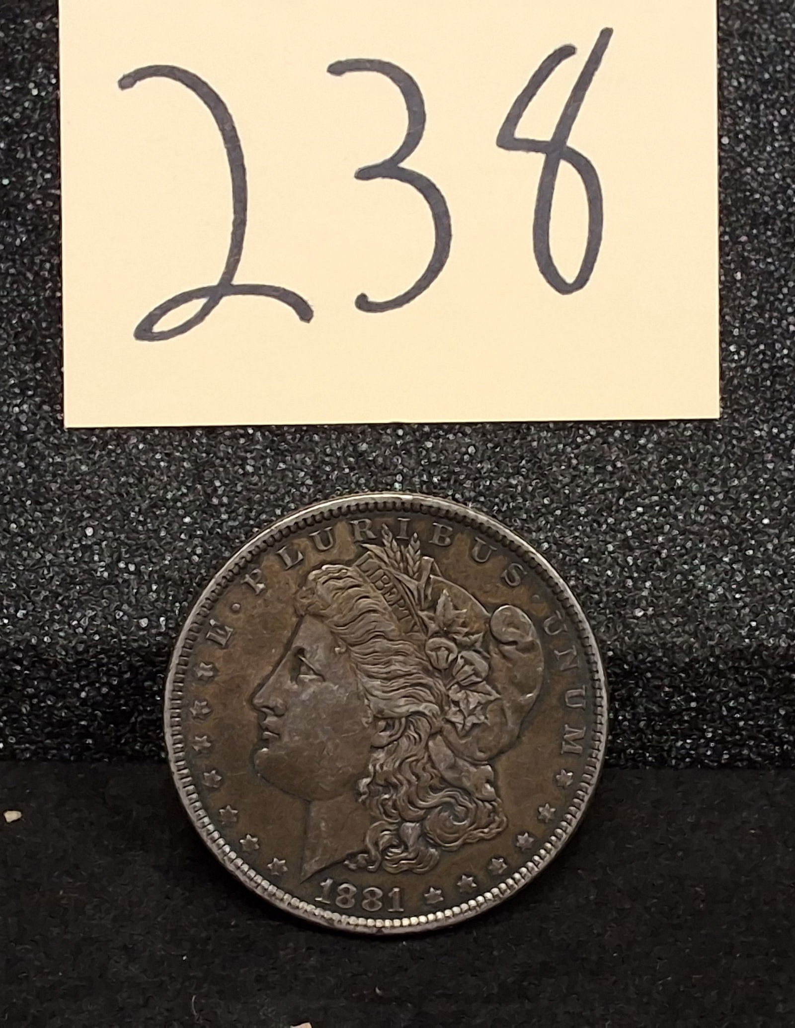 US 1881 Morgan Dollar, Silver, KM-110: Catalog: KM-110. Designer: George T. Morgan. Mint: Philadelphia. Design: Morgan obverse / Eagle reverse. The 1881 Philadelphia issue had a mintage of 9,163,000 pieces.ConditionAll property is sold in