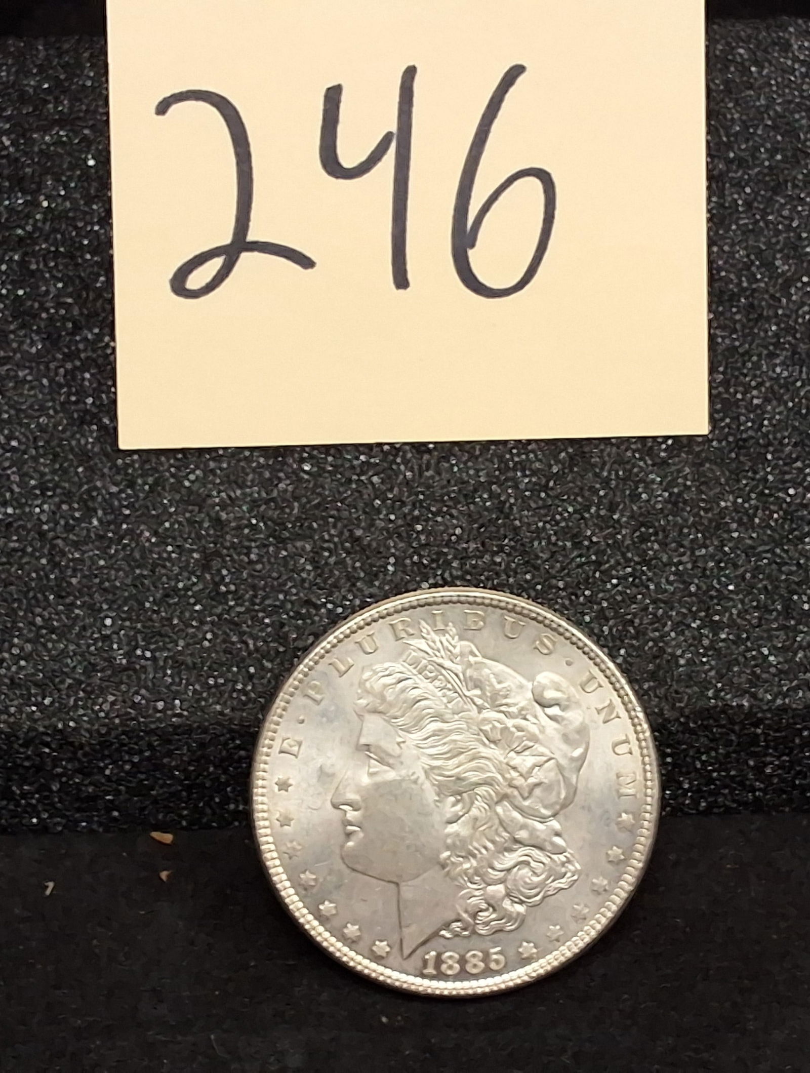 US 1885 Morgan Dollar, Silver, KM-110: KM-110. Designer: George T. Morgan. Philadelphia Mint. Morgan obverse / Eagle reverse. Total mintage: 17,787,000. Condition All property is sold in "as is" condition and all sales are final. Teel Auct