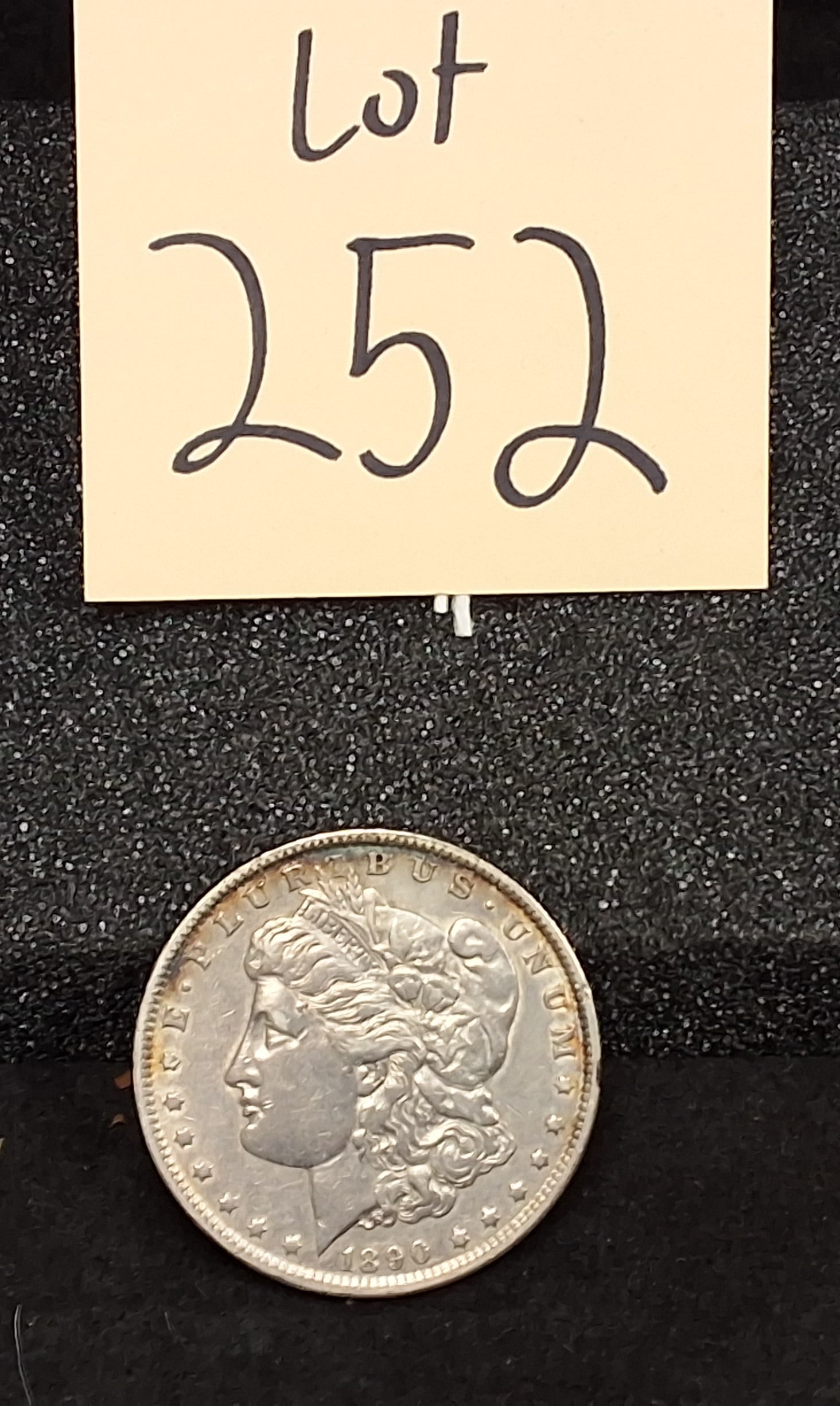 US 1890 Morgan Dollar, Silver, KM-110: Catalog number: KM-110. Designer: George T. Morgan. Philadelphia Mint. Morgan obverse / Eagle reverse. The 1890 Philadelphia mintage totaled 16,802,000 pieces. Condition All property is sold in "as is