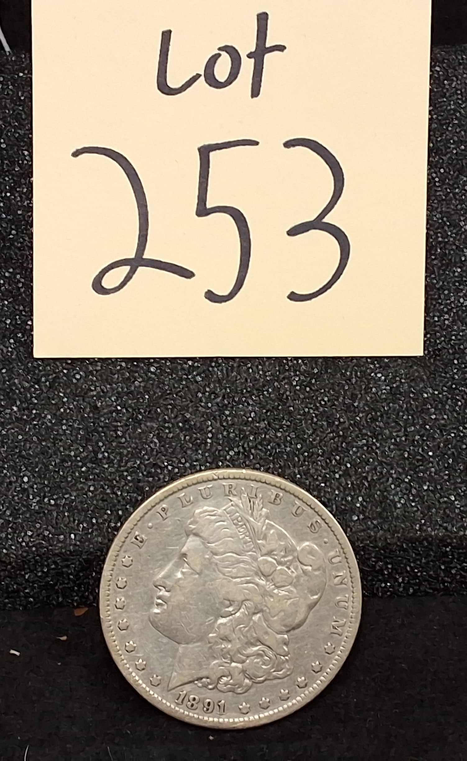 US 1891 One Dollar, Silver, KM-110: Catalog number: KM-110. Designer: George T. Morgan. Mint: Philadelphia. Design type: Liberty Head / Eagle reverse. The 1891 Philadelphia issue had a mintage of 8,693,556 pieces. Condition All property