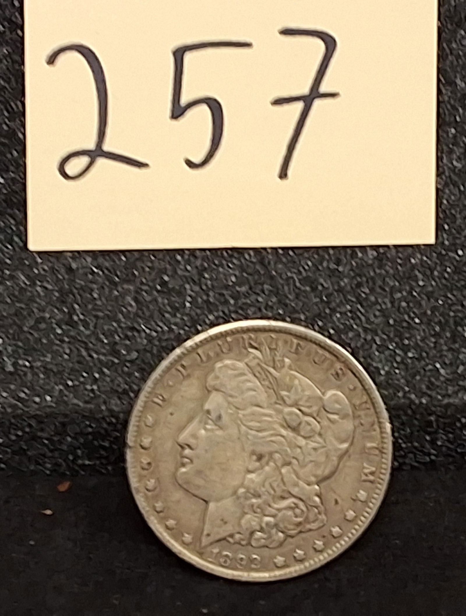 US 1892-O Morgan Silver Dollar, Silver, KM-110: KM-110. Designer: George T. Morgan. Mint mark O for New Orleans located on the reverse. Liberty Head / Eagle reverse. The 1892-O Morgan silver dollar had a total mintage of 2,744,000.ConditionAll