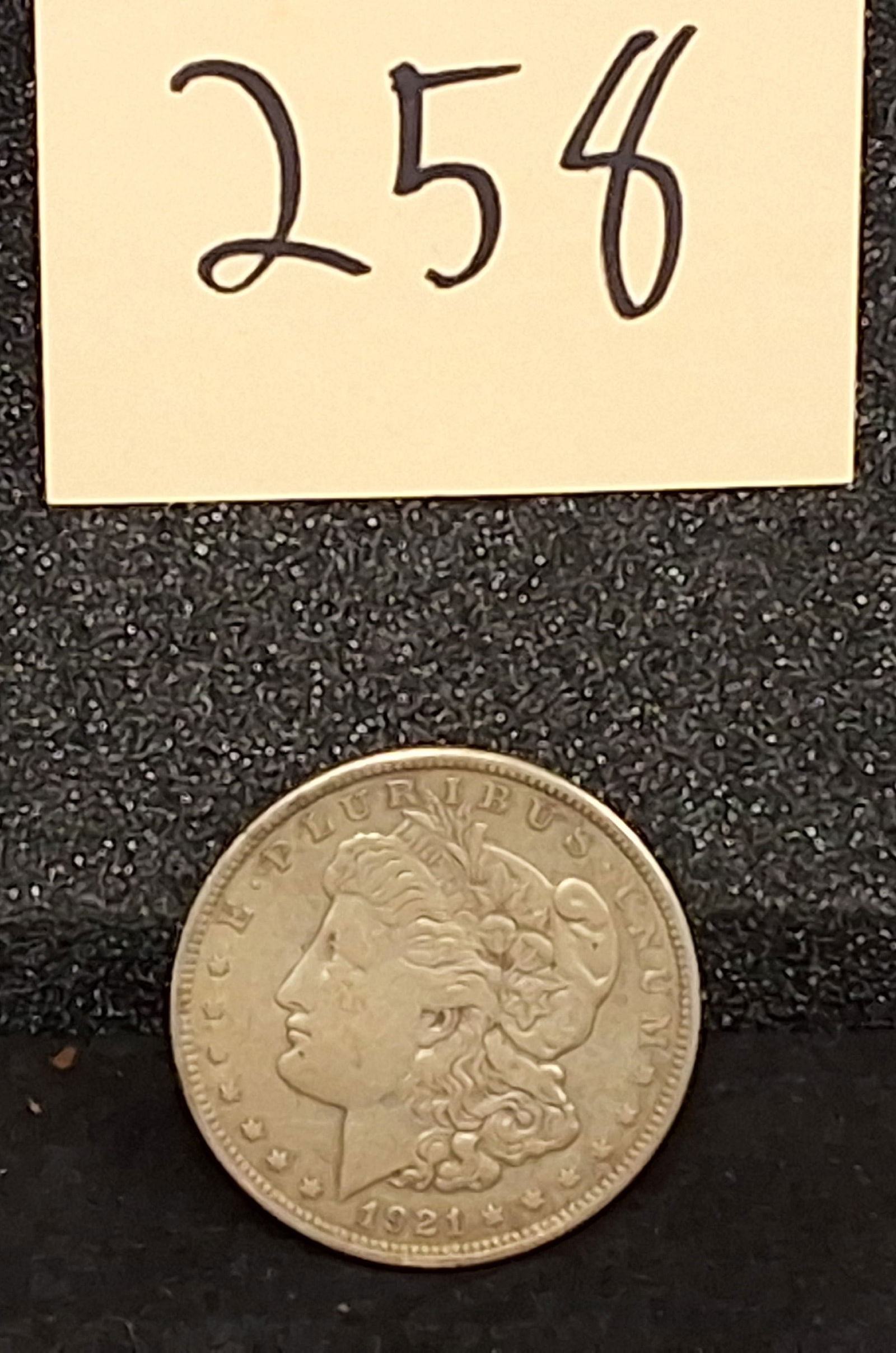 US 1921 Morgan Dollar, Silver, KM-110: KM-110. Designer: George T. Morgan. Philadelphia Mint. Morgan Liberty / Eagle. The 1921 issue represents the final year of the Morgan Dollar series and the only year struck using the redesigned