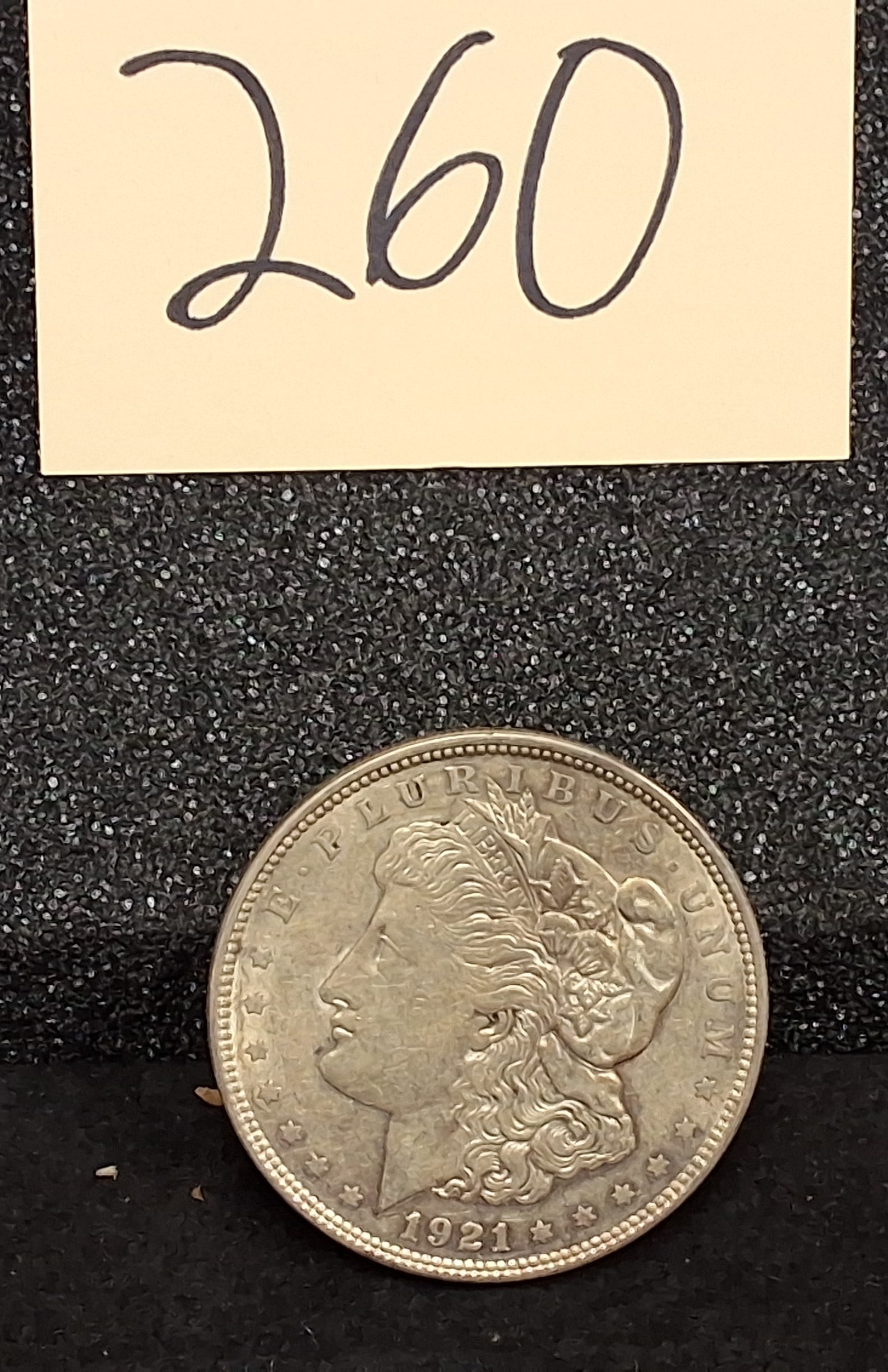US 1921 Morgan Dollar, Silver, KM-110: KM-110. Designer: George T. Morgan. Philadelphia Mint. Morgan obverse / Eagle reverse. This 1921 issue represents the final year of the Morgan dollar series.ConditionAll property is sold in "as is"