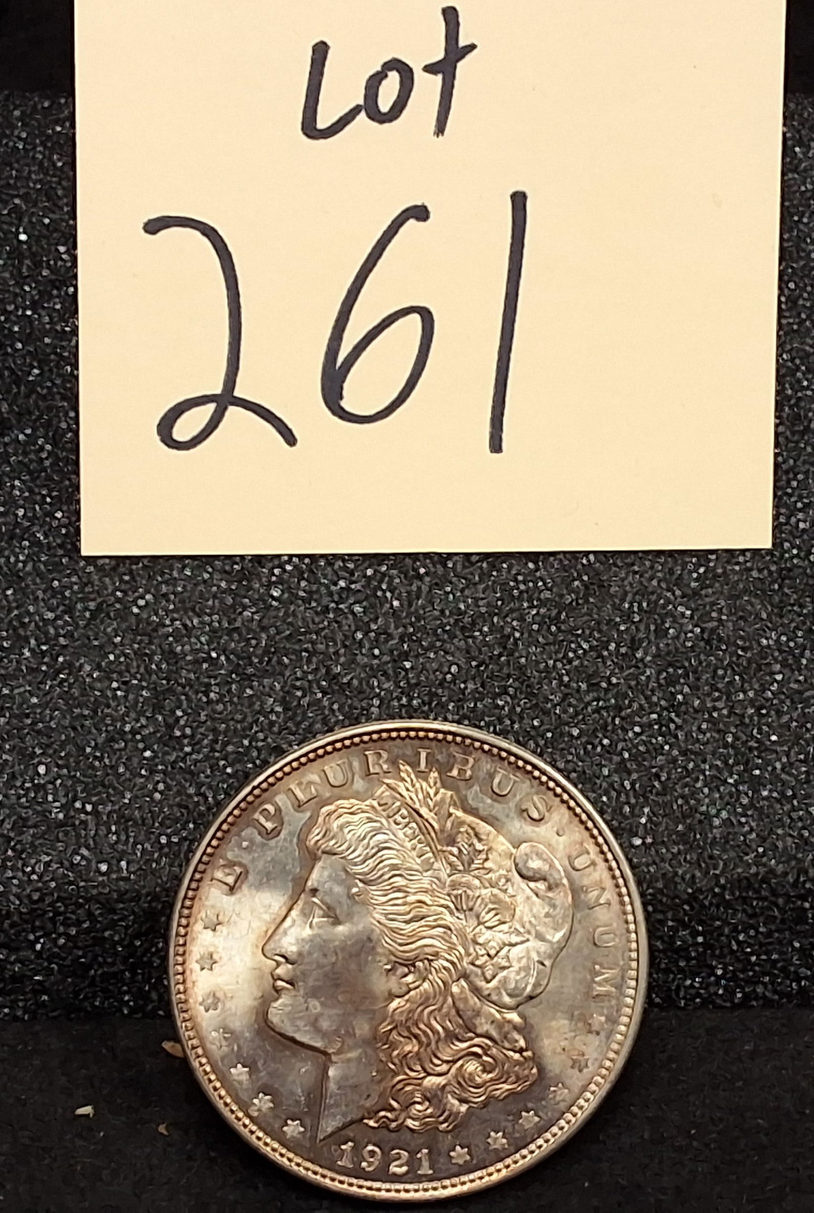 US 1921 Morgan Dollar, Silver, KM-110: Catalog Number: KM-110. Designer: George T. Morgan. Mint: Philadelphia. Design Type: Liberty Head / Eagle. Key identifiers: Reeded edge. Historical note: The 1921 issue represents the final year of