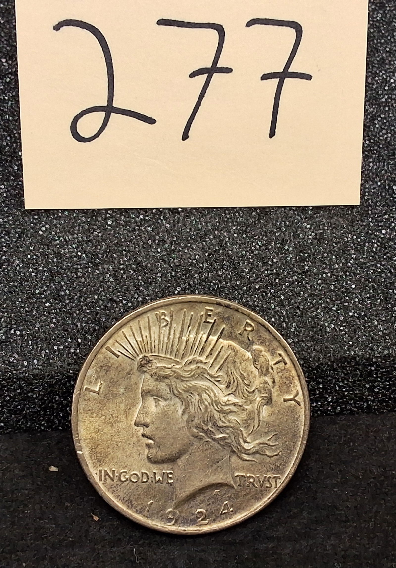 US 1924 One Dollar, Silver, KM-150: Catalog number KM-150. Designer Anthony de Francisci. Philadelphia Mint. Liberty / Eagle type. Total mintage for this issue was 10,138,000.ConditionAll property is sold in "as is" condition and all