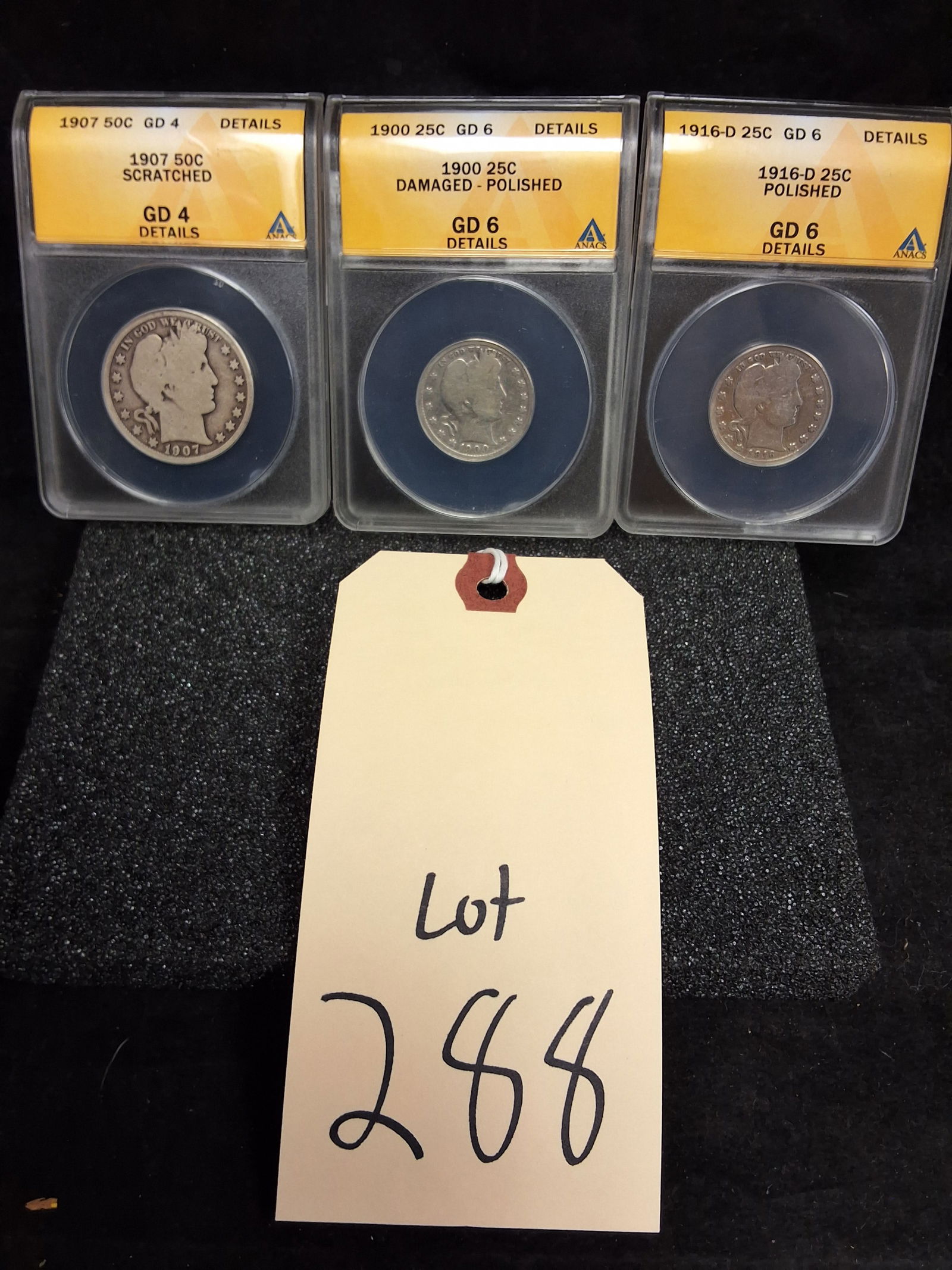 A Trio of US 1900-1916 Barber Silver Coins, ANACS GD Details: KM# 114 and KM# 116. Designer: Charles E. Barber. This lot includes one 1907 half dollar (Philadelphia), one 1900 quarter (Philadelphia), and one 1916-D quarter (Denver). Barber obverse / Heraldic