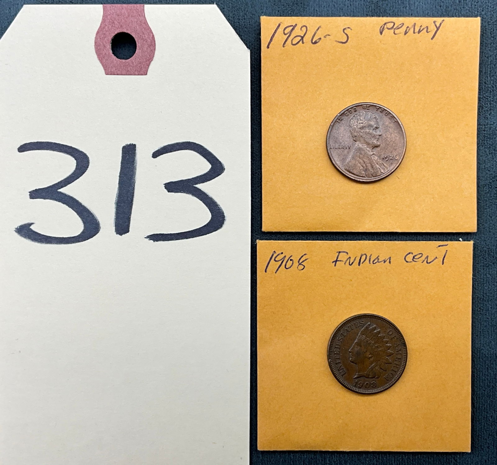 A Pair of US 1908 and 1926-S Cents, Copper, KM-90a and KM-132: This pair of US one-cent coins includes a 1908 Indian Head cent (KM-90a) and a 1926-S Lincoln Wheat cent (KM-132). The 1926-S specimen features the S mint mark for the San Francisco Mint, while the