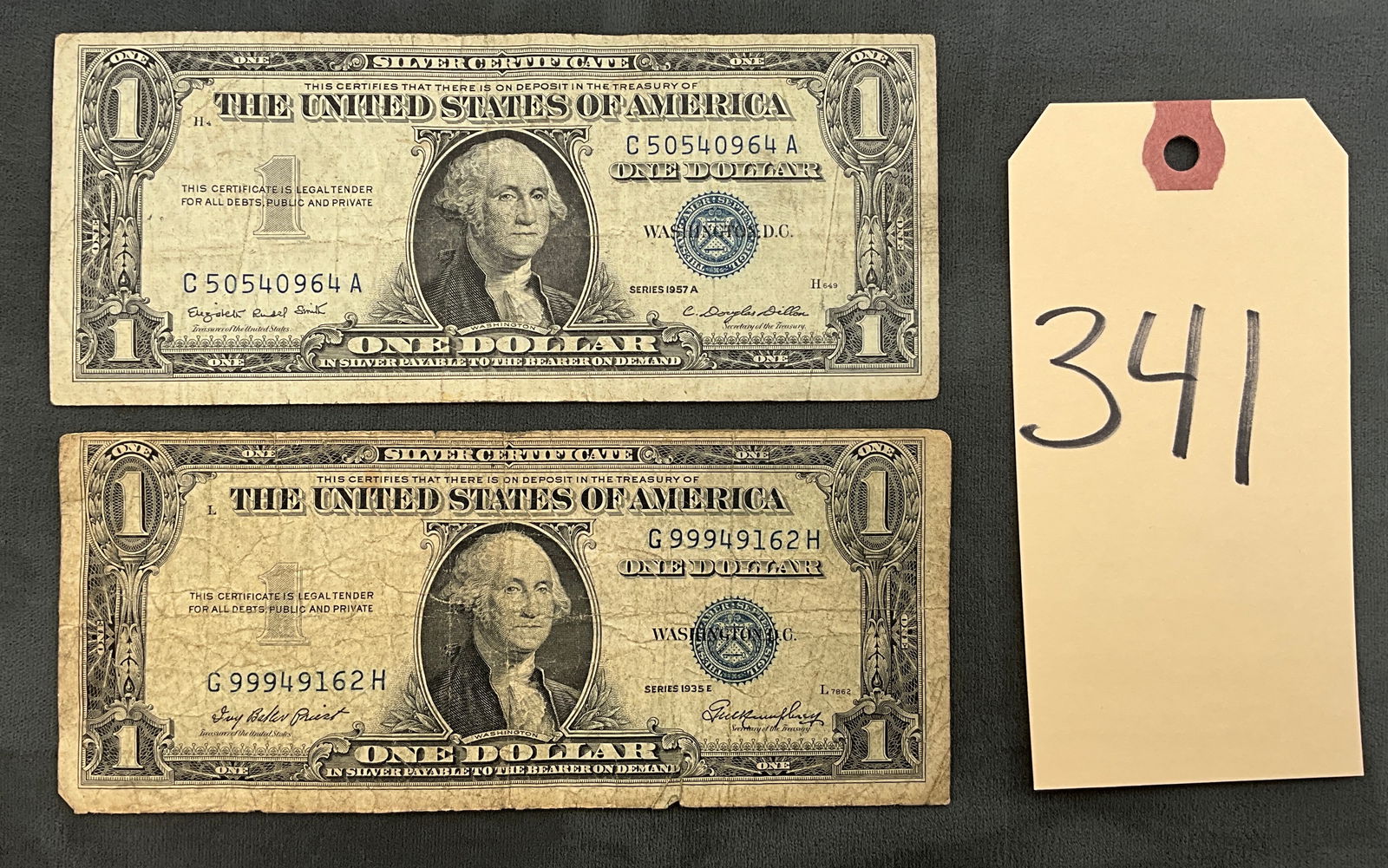 A Pair of US 1935 E and 1957 A $1 Silver Certificates, Paper: This pair includes US $1 Silver Certificates, Fr. 1614 and Fr. 1619, from Series 1935 E and 1957 A with blue seals. Serial numbers are G 99949162 H and C 50540964 A, representing currency formerly red
