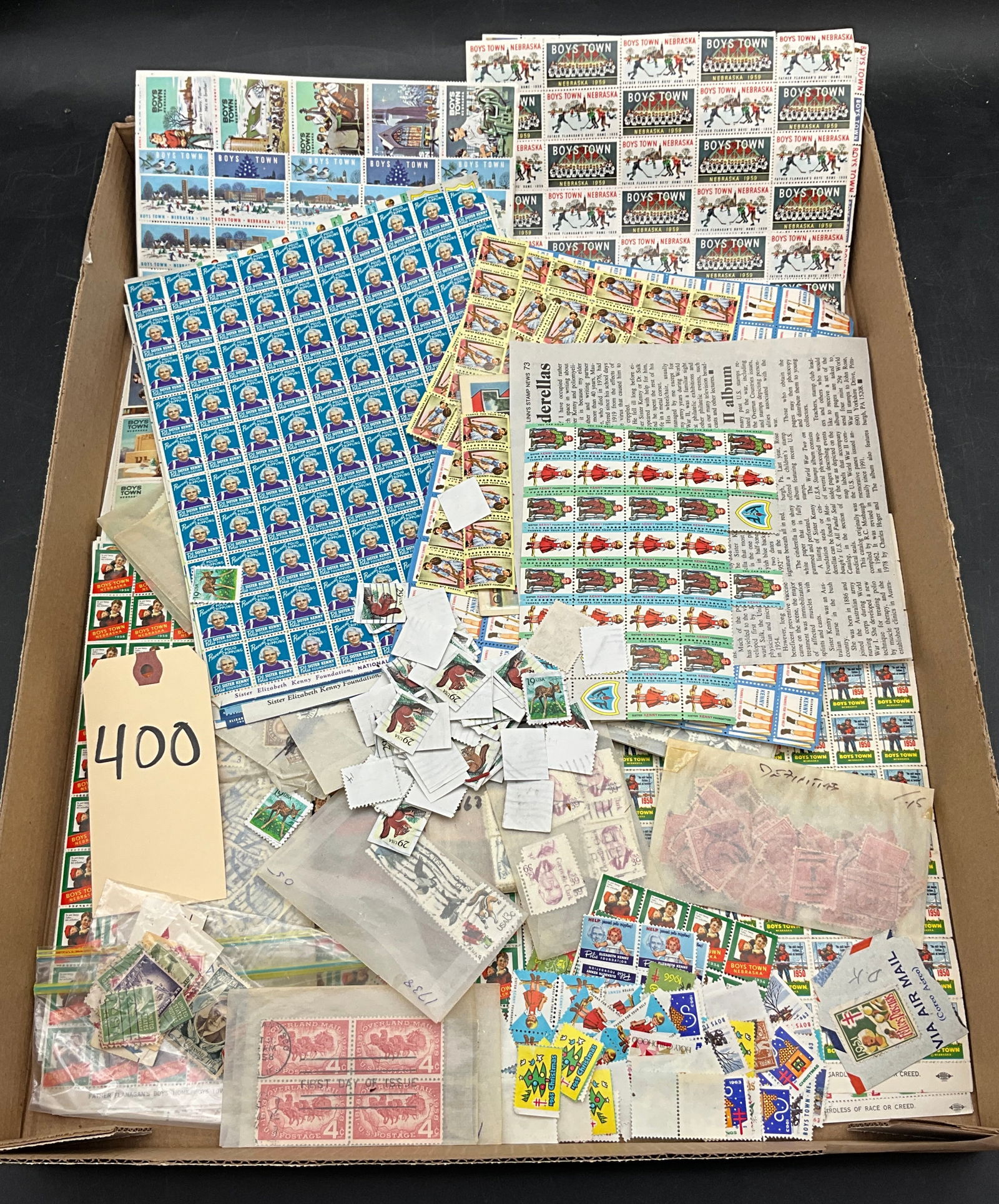 A Lot of US 1950-1990s Postage Stamps and Boys Town Charity Seals: This lot features numerous full and partial sheets of Boys Town, Nebraska charity seals from 1950, 1954, 1959, and 1961. Included are Sister Elizabeth Kenny Foundation polio prevention sheets and US p