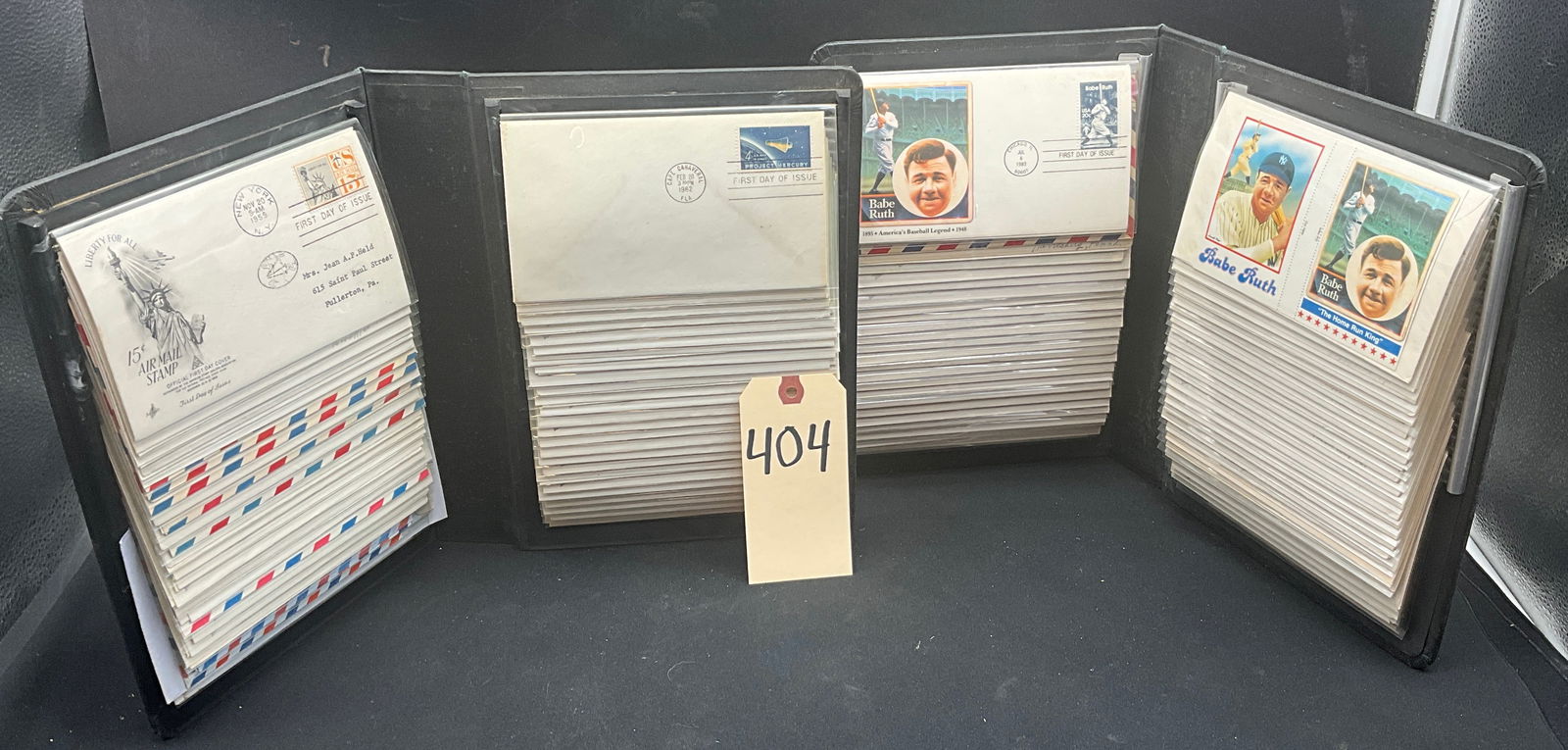 US First Day Cover and Ephemera Collection, 1950s-1980s: This extensive collection contains philatelic items, primarily First Day Covers and vintage postal cards housed in two binders. Please note key historical highlights include 1959 Hawaii and Alaska sta