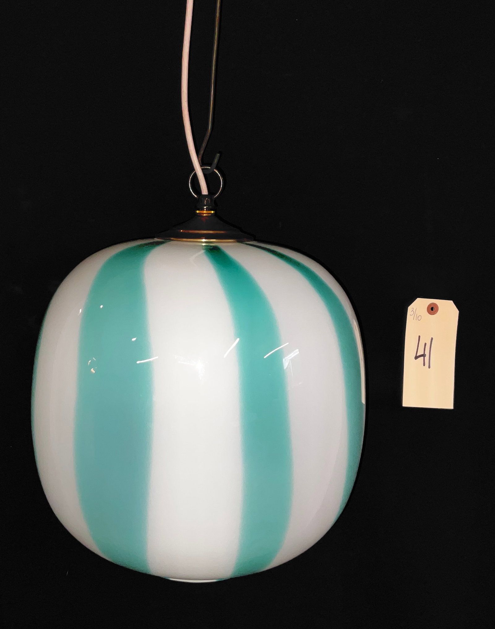 Millefiori Interior Italian Style Striped Glass Pendant Light, Mid-Century Modern: This Mid-Century Modern style pendant light features a large, rounded cased glass shade with bold, alternating vertical stripes of opaque white and translucent teal. The fixture is topped with a gold-