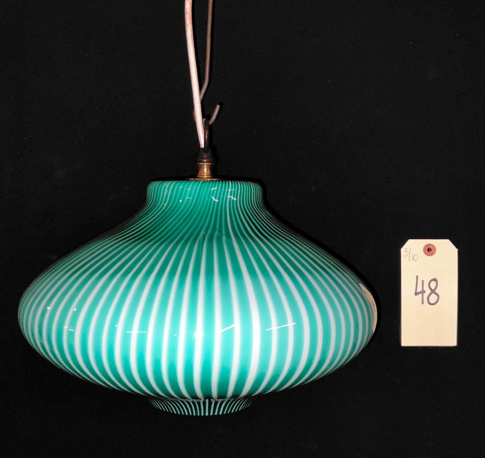 Massimo Vignelli for Venini Pendant Lamp, Mid-Century Modern, Teal Stripe: This Mid-Century Modern pendant lamp is attributed to Massimo Vignelli for Venini and features a large, flattened-ovoid glass shade. The shade is composed of teal-green cased glass with internal radia
