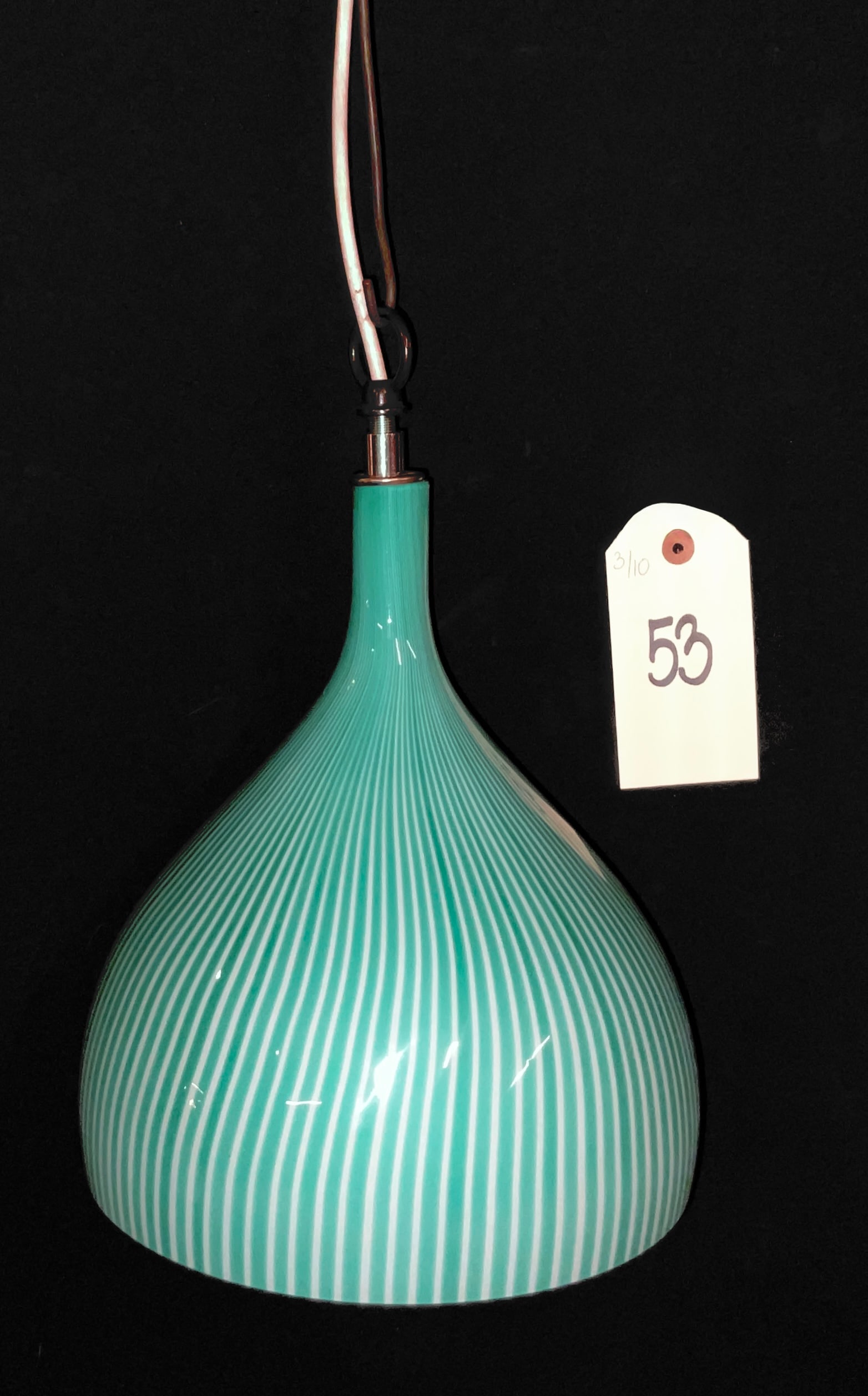 Massimo Vignelli for Venini Murano Filigrana Art Glass Pendant Light: This mid-century modern pendant lamp was designed by Massimo Vignelli for Venini and features a teardrop-shaped shade with a teal and white filigrana pattern. The hand-blown glass shade is cased with