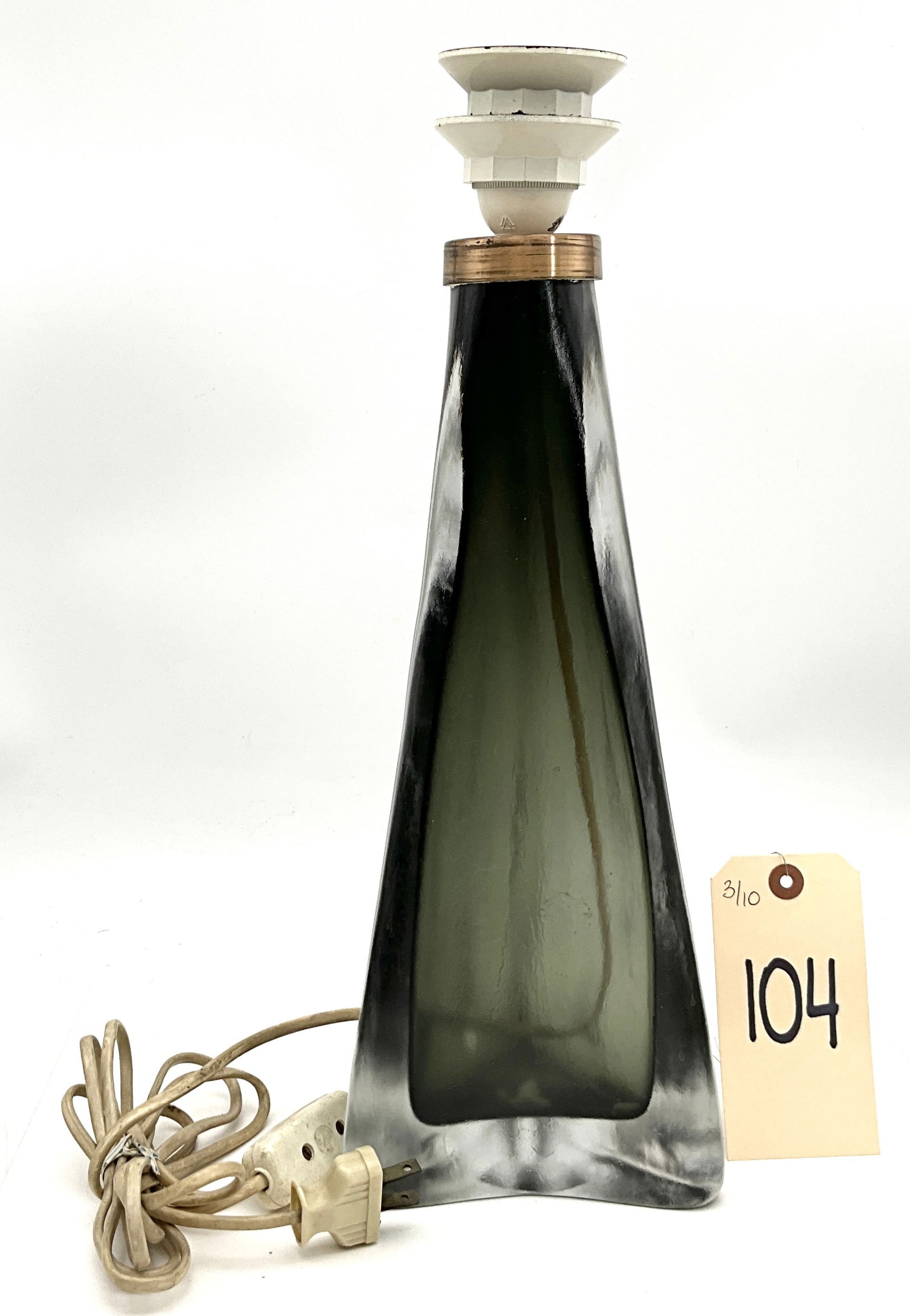 Carl Fagerlund for Orrefors Smoky Green Glass Table Lamp: Designed by Carl Fagerlund for Orrefors, this mid-century modern lamp base is crafted from thick, smoky-green art glass in a tapered triangular form with an integrated concave base. The piece features
