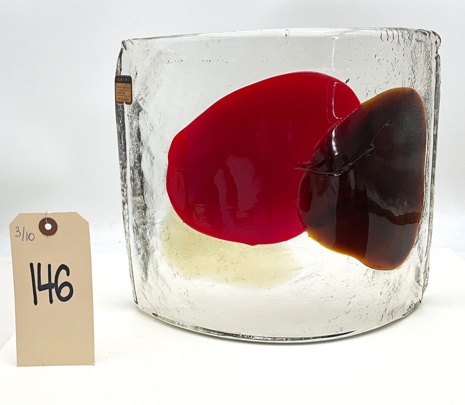 Venini Murano Mid-Century Modern Art Glass Curved Panel with Abstract Inclusions: This Mid-Century Modern free-standing curved panel is crafted by Venini Murano from thick, clear glass featuring a heavily textured, ice-like surface. The piece showcases large, abstract internal incl