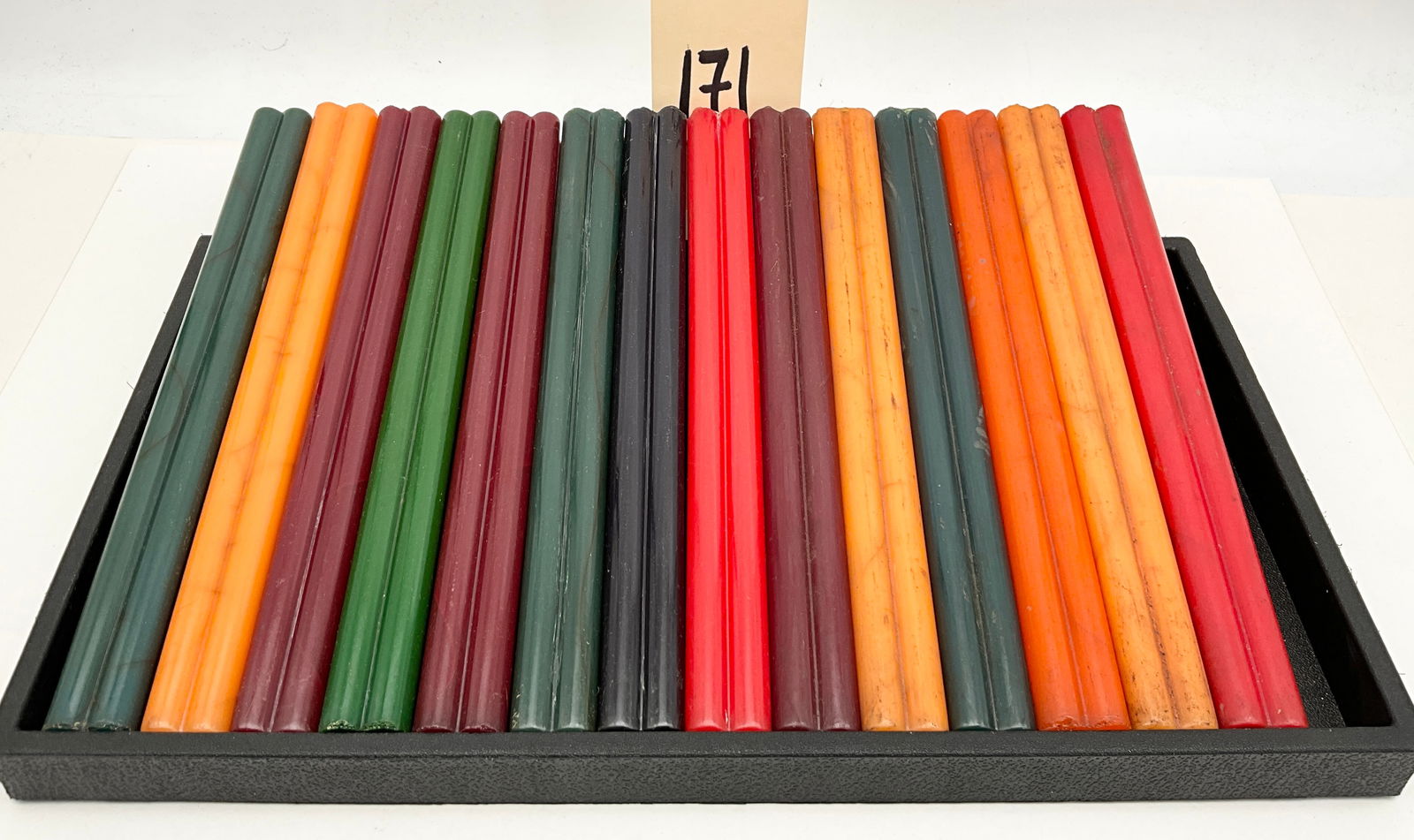 Collection of 14 Vintage Bakelite Rods with Quatrefoil Cross-Section 10 Inch: This collection features 14 vintage Bakelite phenolic resin rods rendered in a diverse palette of red, orange, burgundy, forest green, teal, and black. Each rod is molded with a distinctive quatrefoil