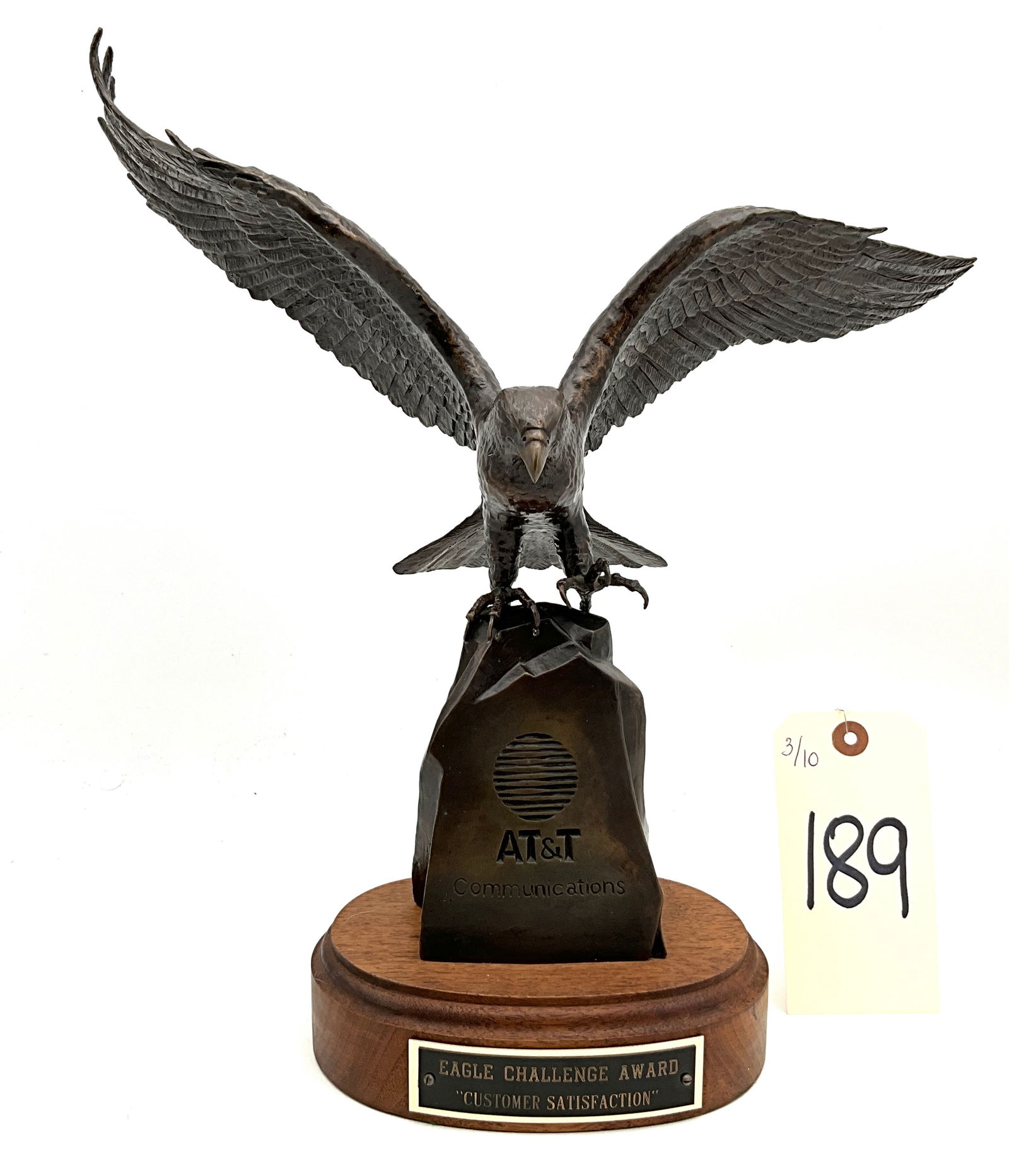 Bronze, Eagle Sculpture, AT&T Award by DiPasquale: This bronze sculpture by DiPasquale was cast using the lost-wax method in 1983. The realistic late 20th-century piece features the AT&T Communications logo and is mounted on a tiered hardwood base. It
