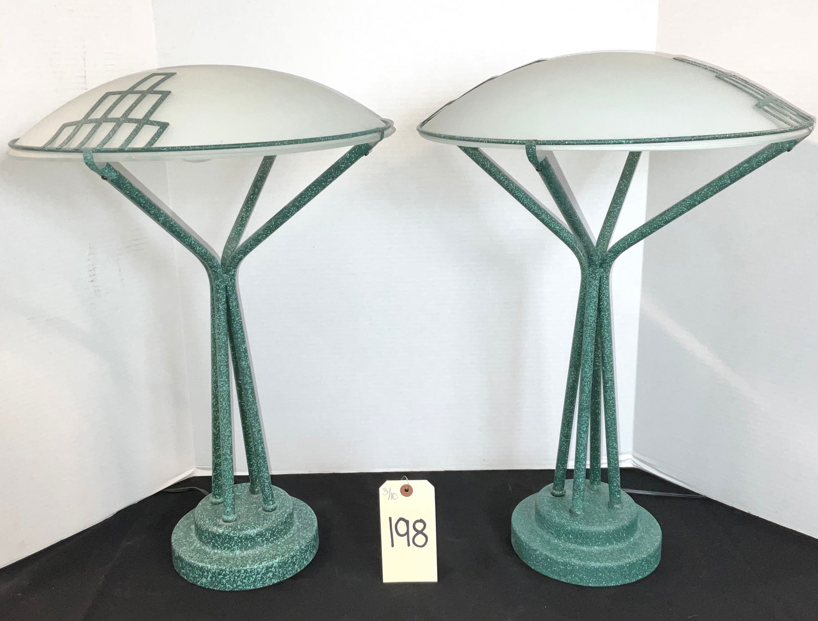 Pair of Postmodern Art Deco Style Spatter Finish Skyscraper Table Lamps: This pair of contemporary table lamps features a striking Art Deco-inspired skyscraper motif with a distinctive green and light-green speckled spatter finish on the metal frames. Each lamp supports a