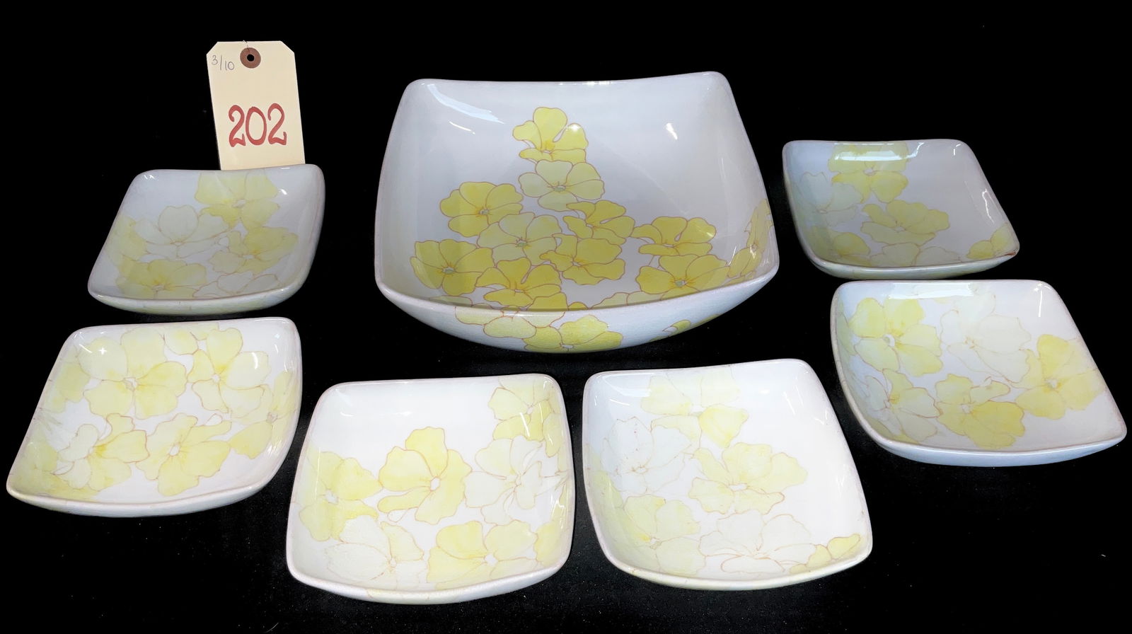 Mid-Century Modern Ernestine Salerno Italian Hand-Painted Maiolica Bowl Set: This seven-piece set of Italian maiolica was produced by Ernestine in Salerno, Italy, and features a distinctive Mid-Century Modern square form with rounded corners. Each piece is hand-painted with a